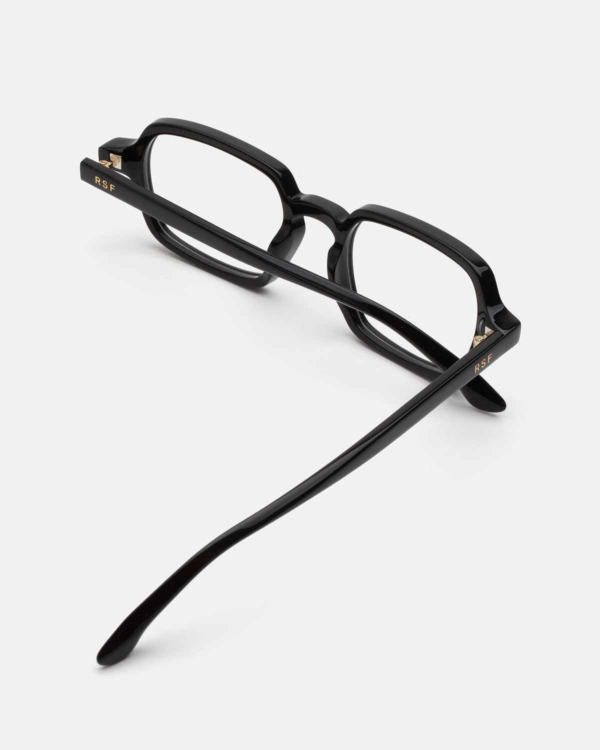Overhead view of RETROSUPERFUTURE Numero 141 Nero sunglasses showing temples and gold hardware.