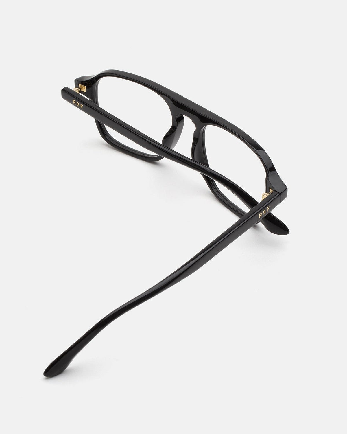 Underside view of RETROSUPERFUTURE Numero 142 Nero sunglasses showing temple and hinge detail.