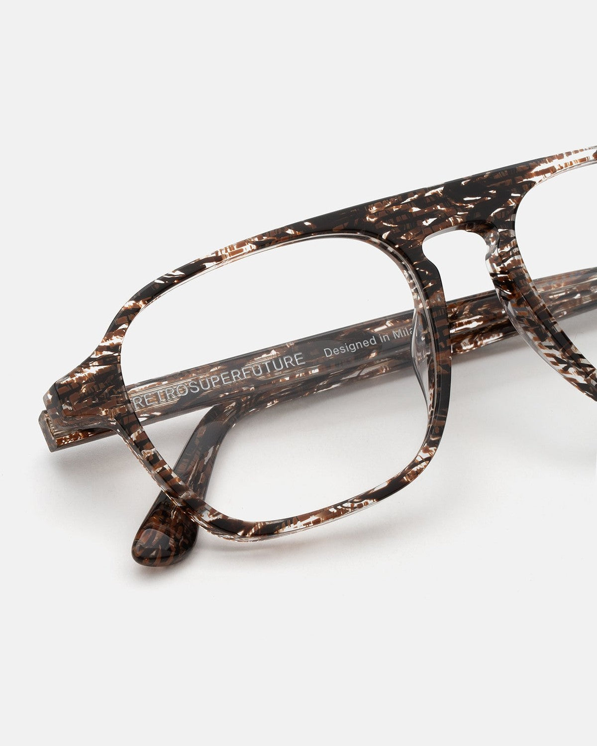 Close-up of the temple and bridge detail on RETROSUPERFUTURE Numero 142 Strambo sunglasses.