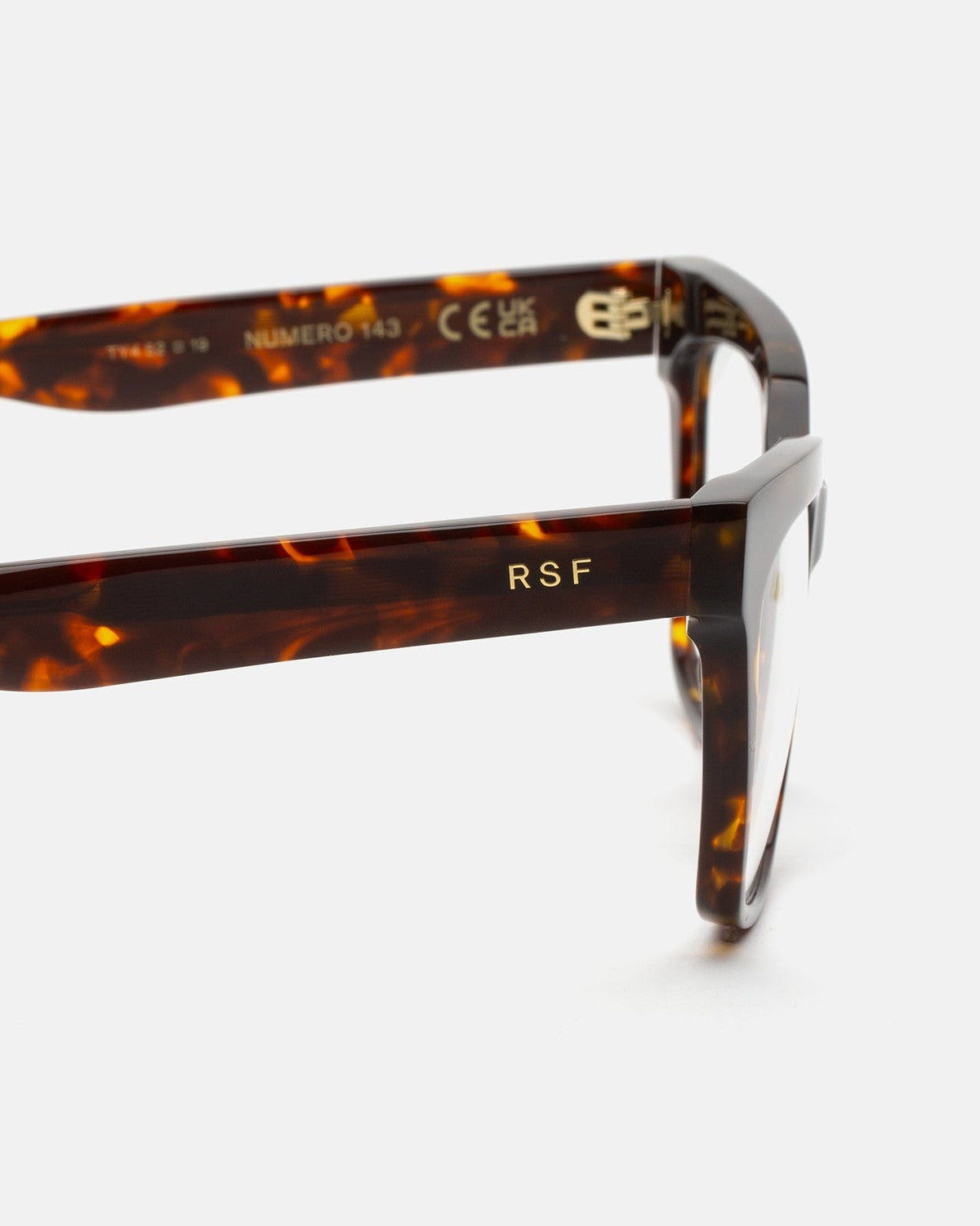 Close-up of the temple with RSF logo on RETROSUPERFUTURE Numero 143 Burnt sunglasses.