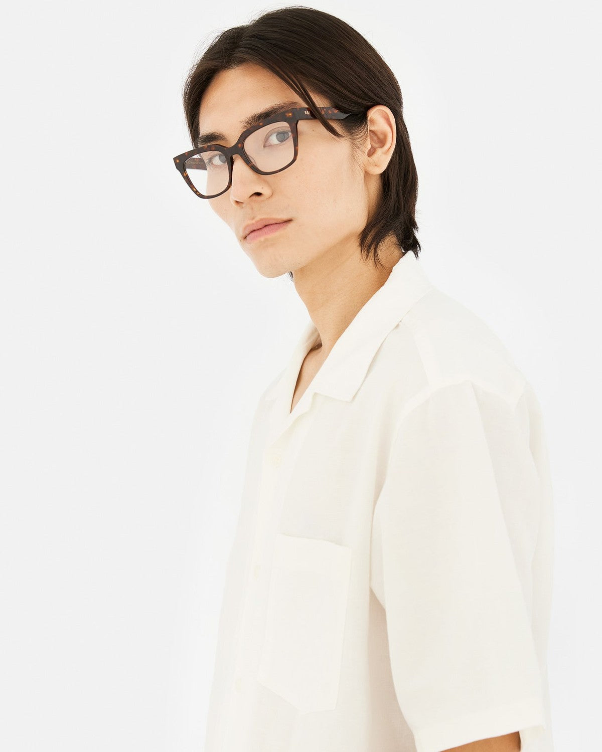 Side profile of model wearing RETROSUPERFUTURE Numero 143 Burnt sunglasses.