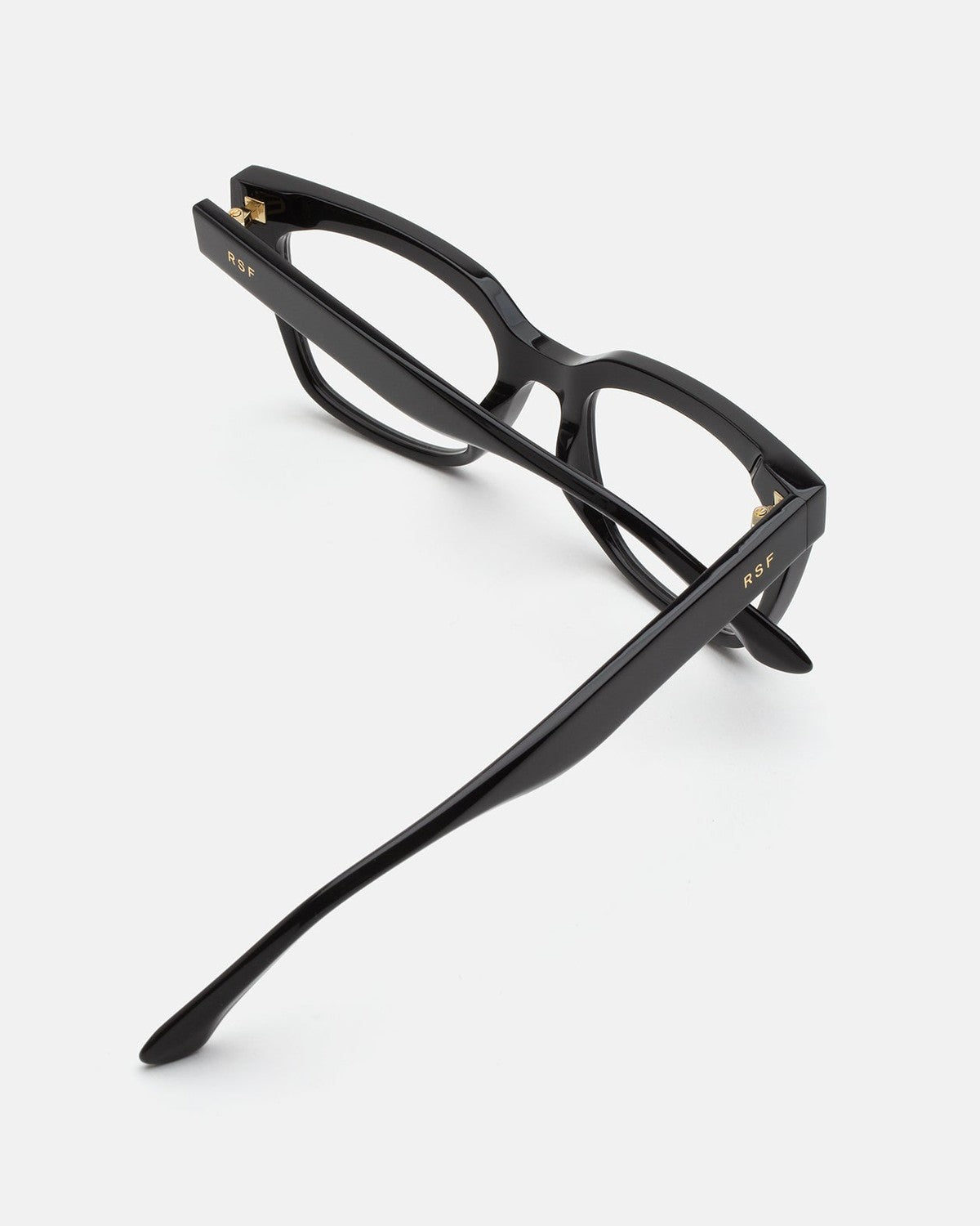 Interior view showing the temples and hinges of RETROSUPERFUTURE Numero 143 Nero sunglasses.