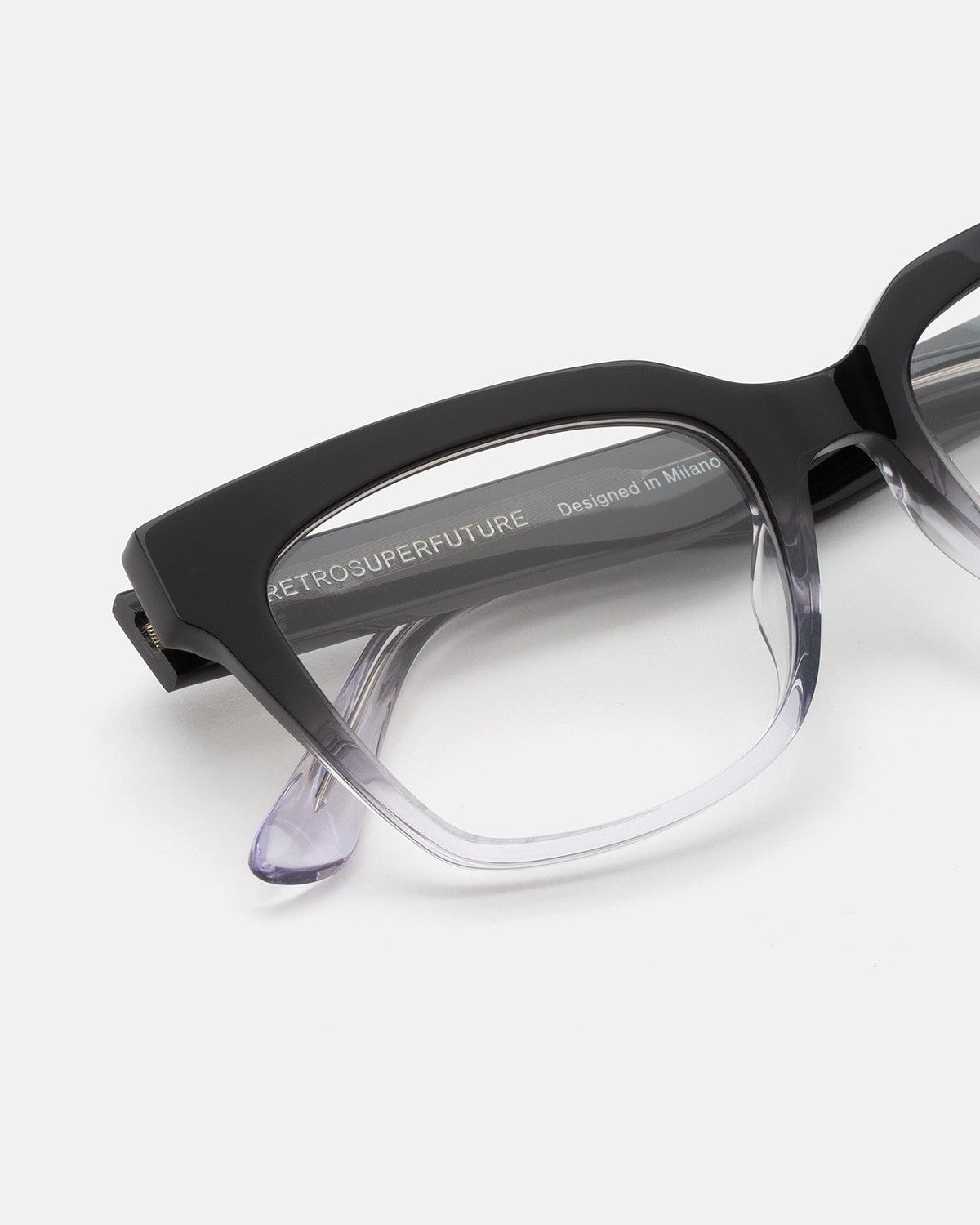 Close-up of the temple and hinge on RETROSUPERFUTURE Numero 143 Nero Sfumato sunglasses.