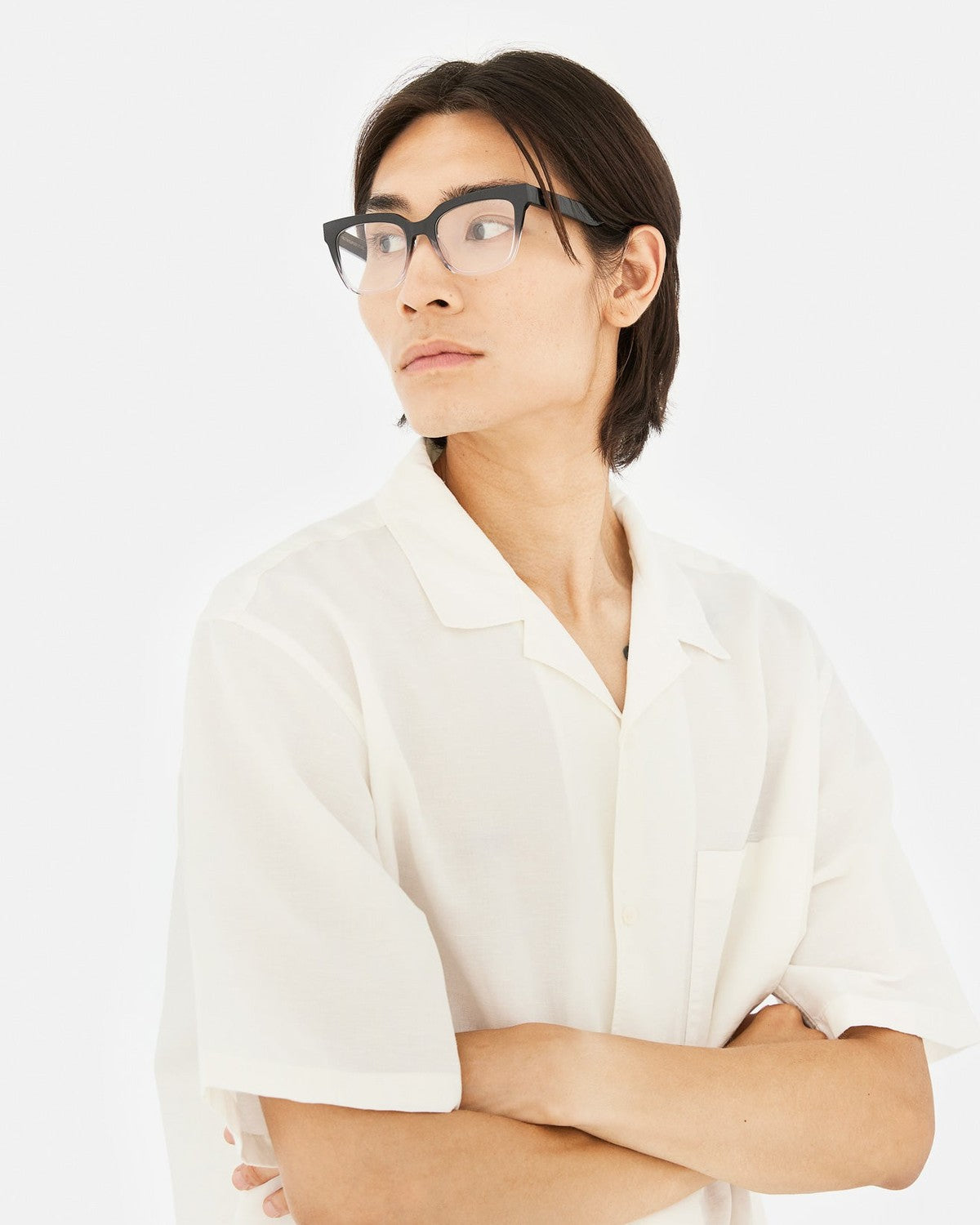 Side profile of model wearing RETROSUPERFUTURE Numero 143 Nero Sfumato sunglasses.