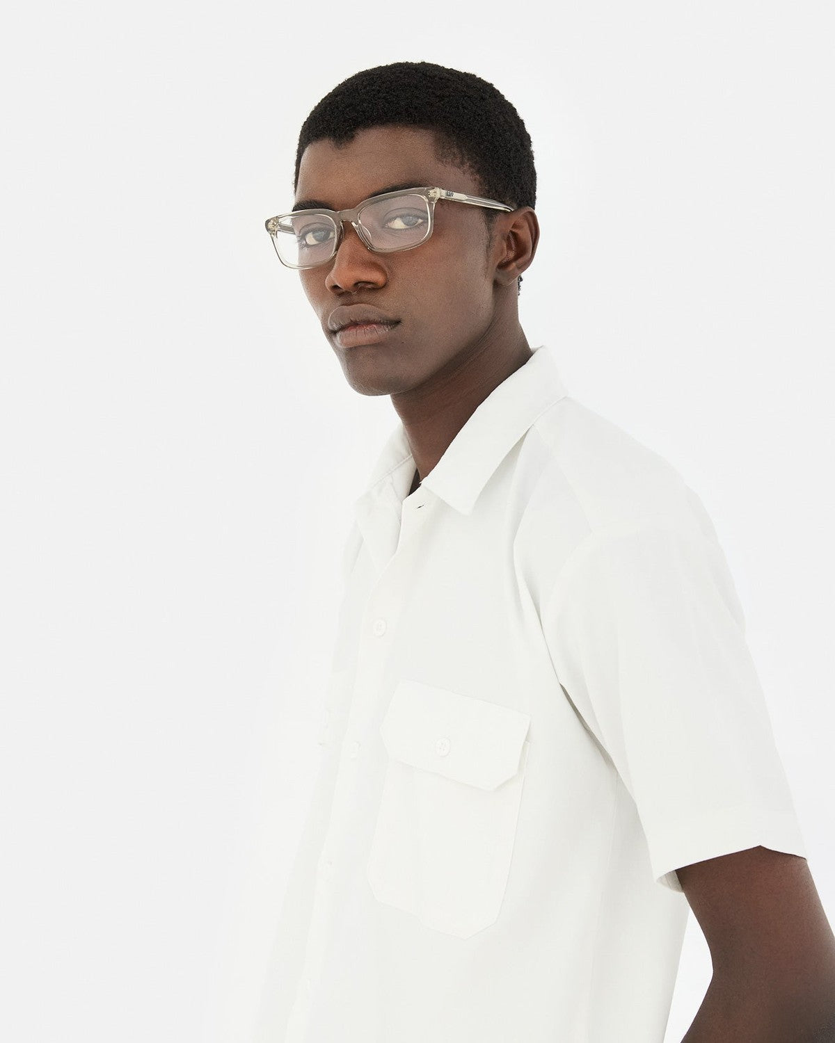 Side profile of model wearing RETROSUPERFUTURE Numero 146 Nebbia sunglasses.