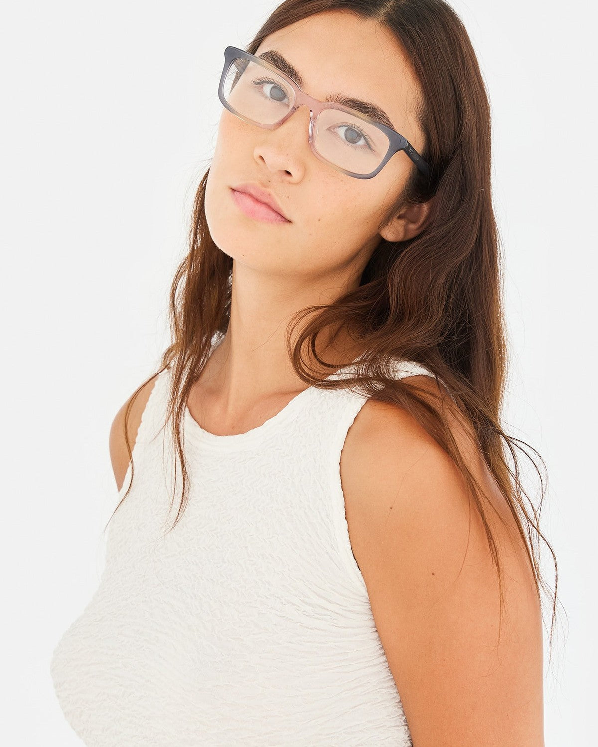 Model wearing RETROSUPERFUTURE Numero 146 Side Fade sunglasses with a white textured top.