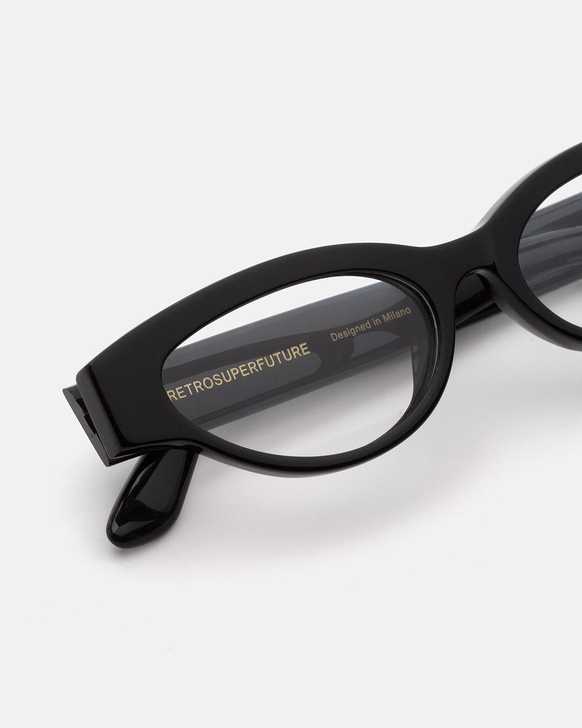 Close-up of the temple and hinge detail on RETROSUPERFUTURE Numero 147 Nero sunglasses.