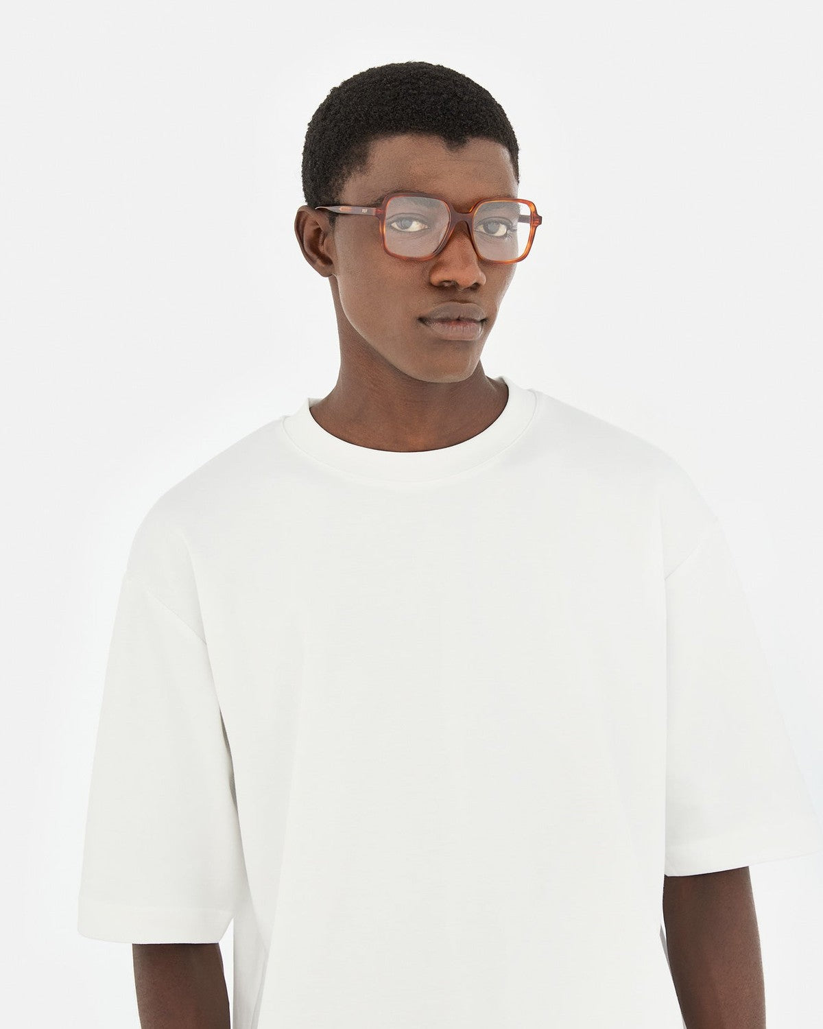 Model wearing RETROSUPERFUTURE Numero 149 Tabacco sunglasses.