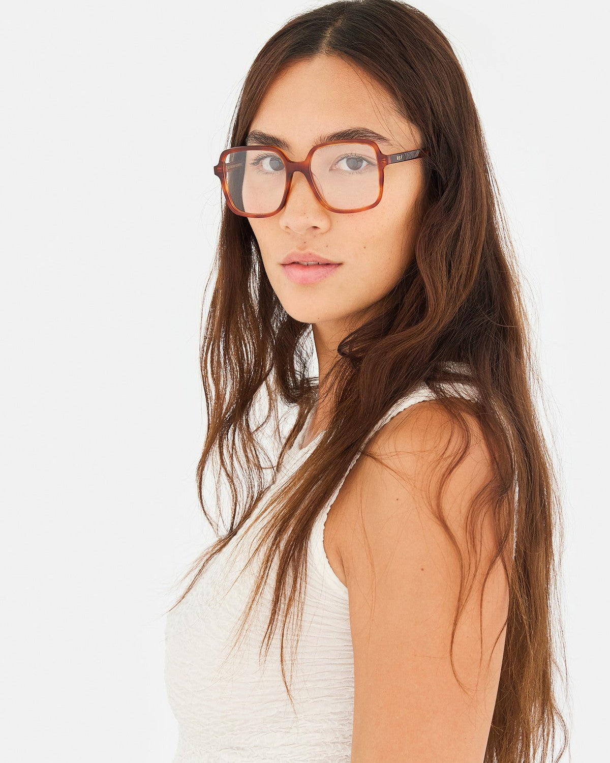 Side profile of model wearing RETROSUPERFUTURE Numero 149 Tabacco sunglasses.