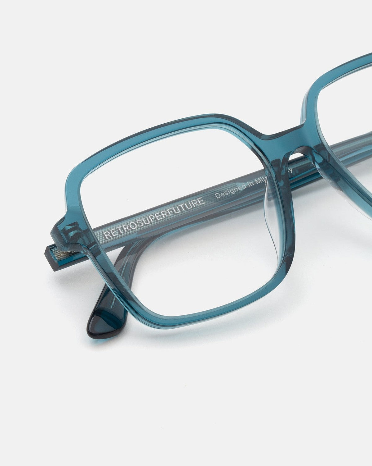 Close-up of the temple and hinge on RETROSUPERFUTURE Numero 149 Teal sunglasses.