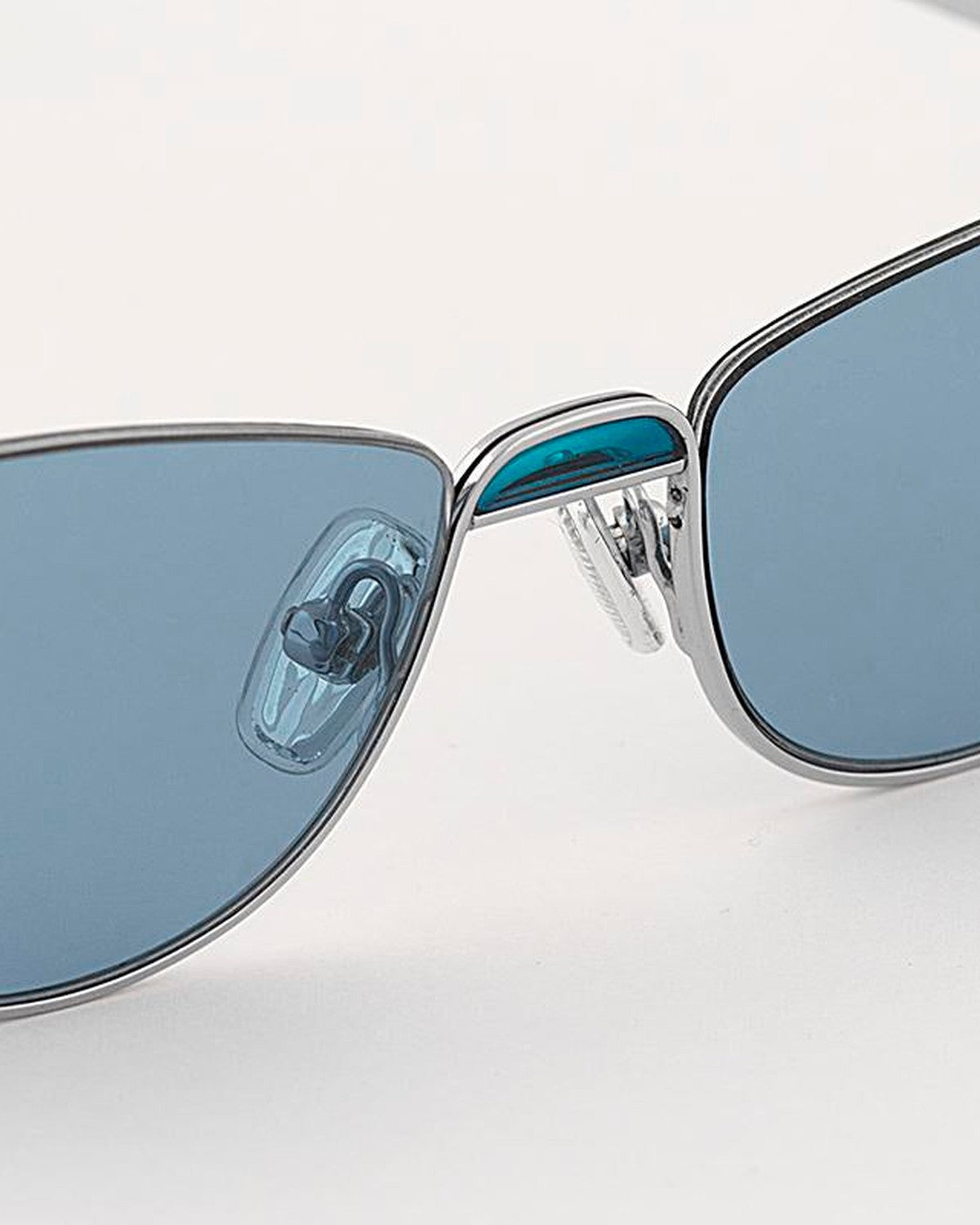 Close-up of the nose bridge and adjustable nose pads on EYEPETIZER ODAIBA C.1-65 sunglasses.