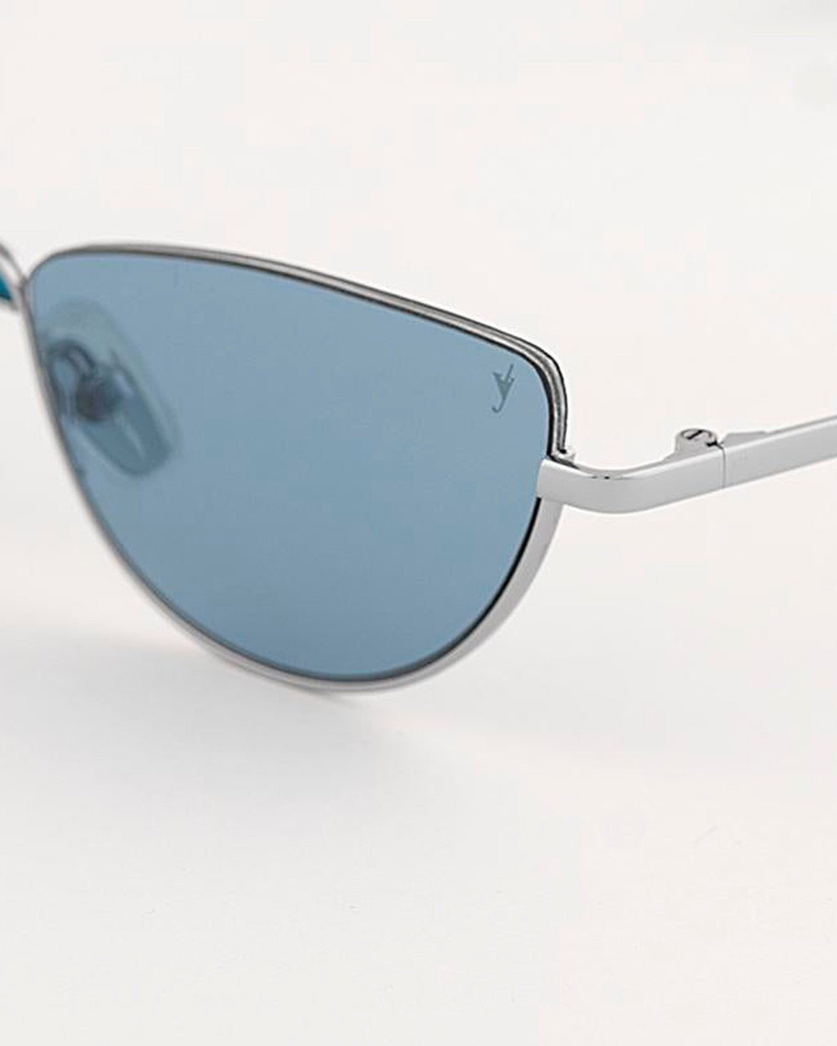 Detail of the left lens and temple hinge on EYEPETIZER ODAIBA C.1-65 sunglasses.