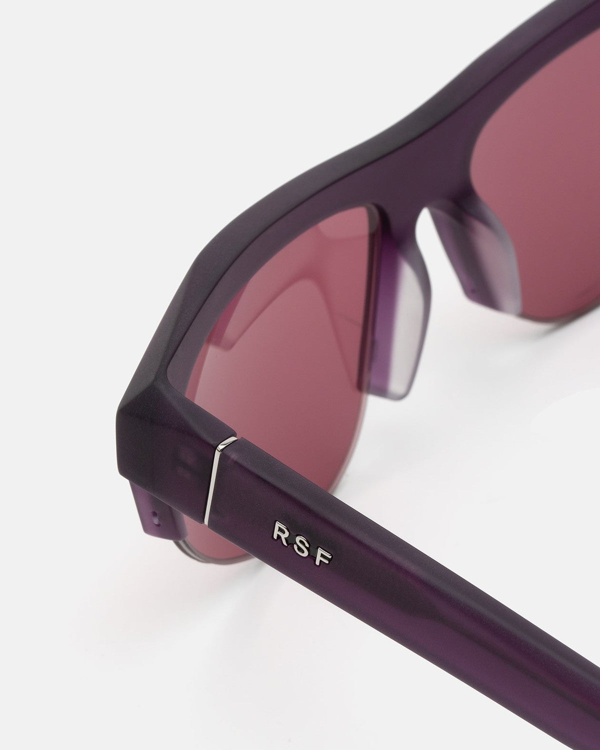 Close-up of the temple hinge on RETROSUPERFUTURE Ora Melanzana sunglasses.