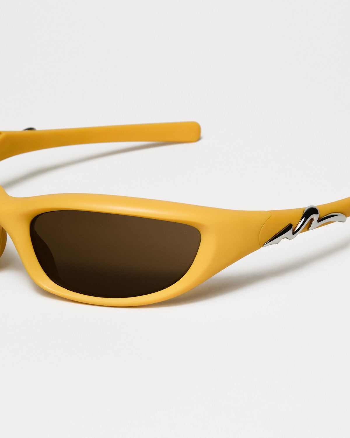 Angled view of CHIMI Pogba Yellow Brown sunglasses.