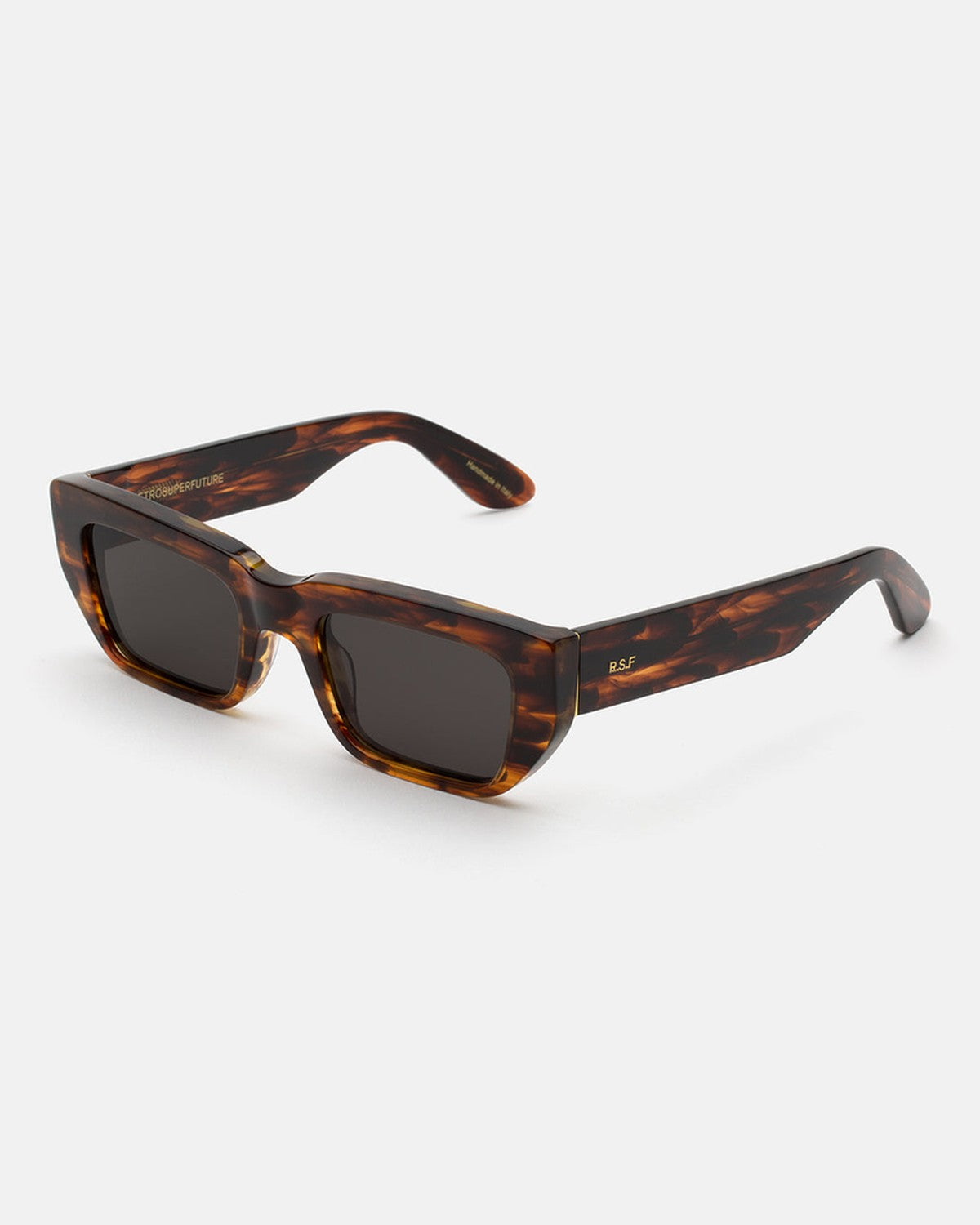 Angled view of RETROSUPERFUTURE Ra Havana Striata sunglasses showing the temple and striped tortoiseshell pattern.