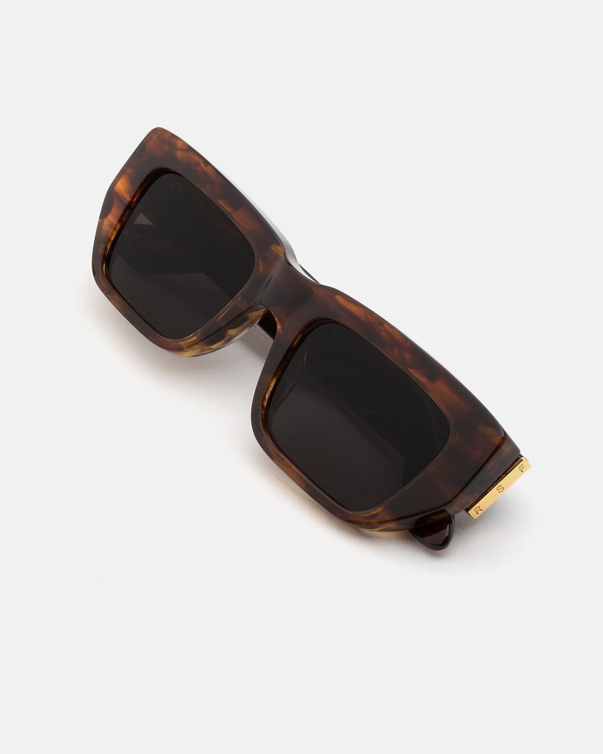 Overhead view of RETROSUPERFUTURE Ra Havana Striata sunglasses showing temple detail.