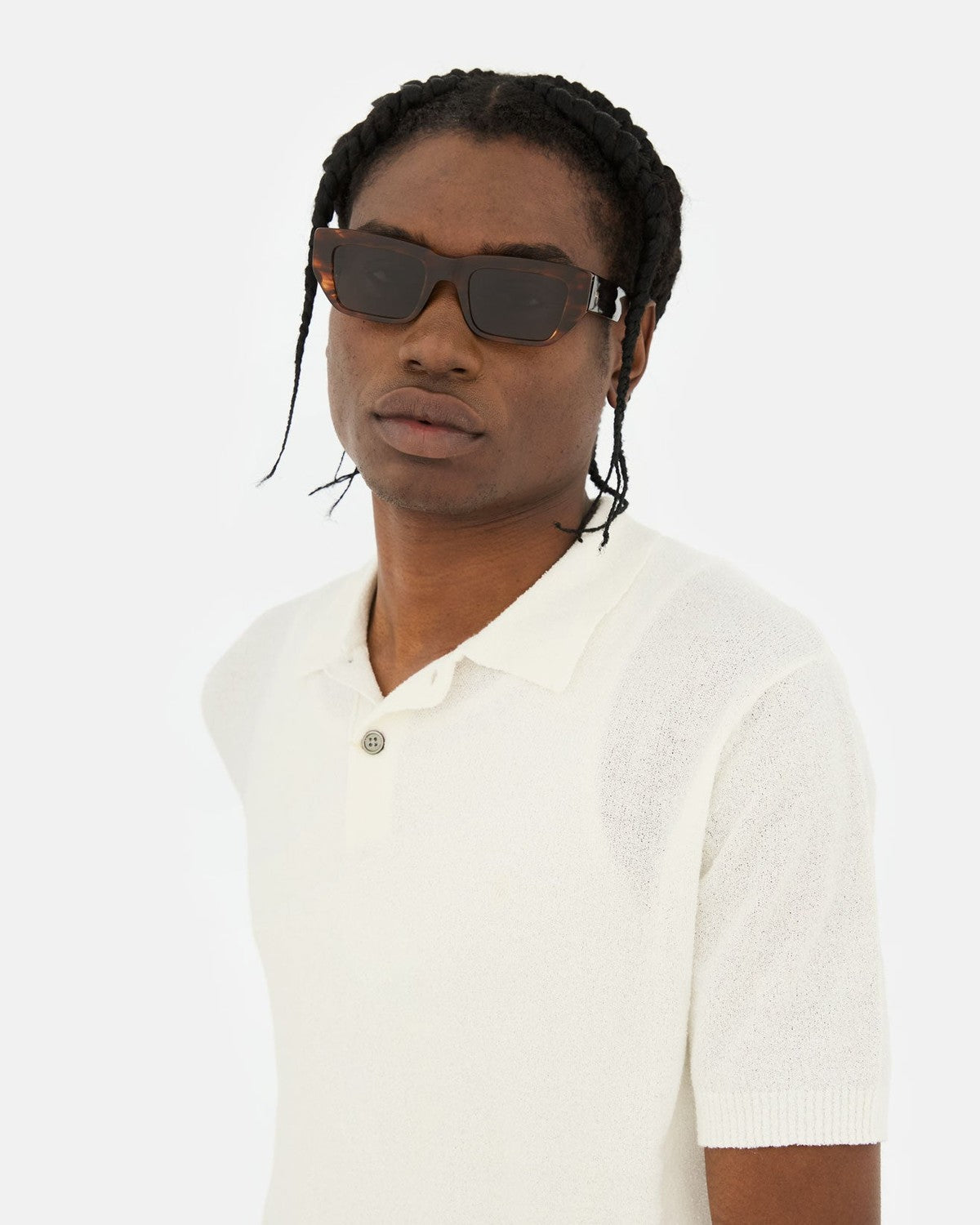 Model wearing RETROSUPERFUTURE Ra Havana Striata sunglasses.