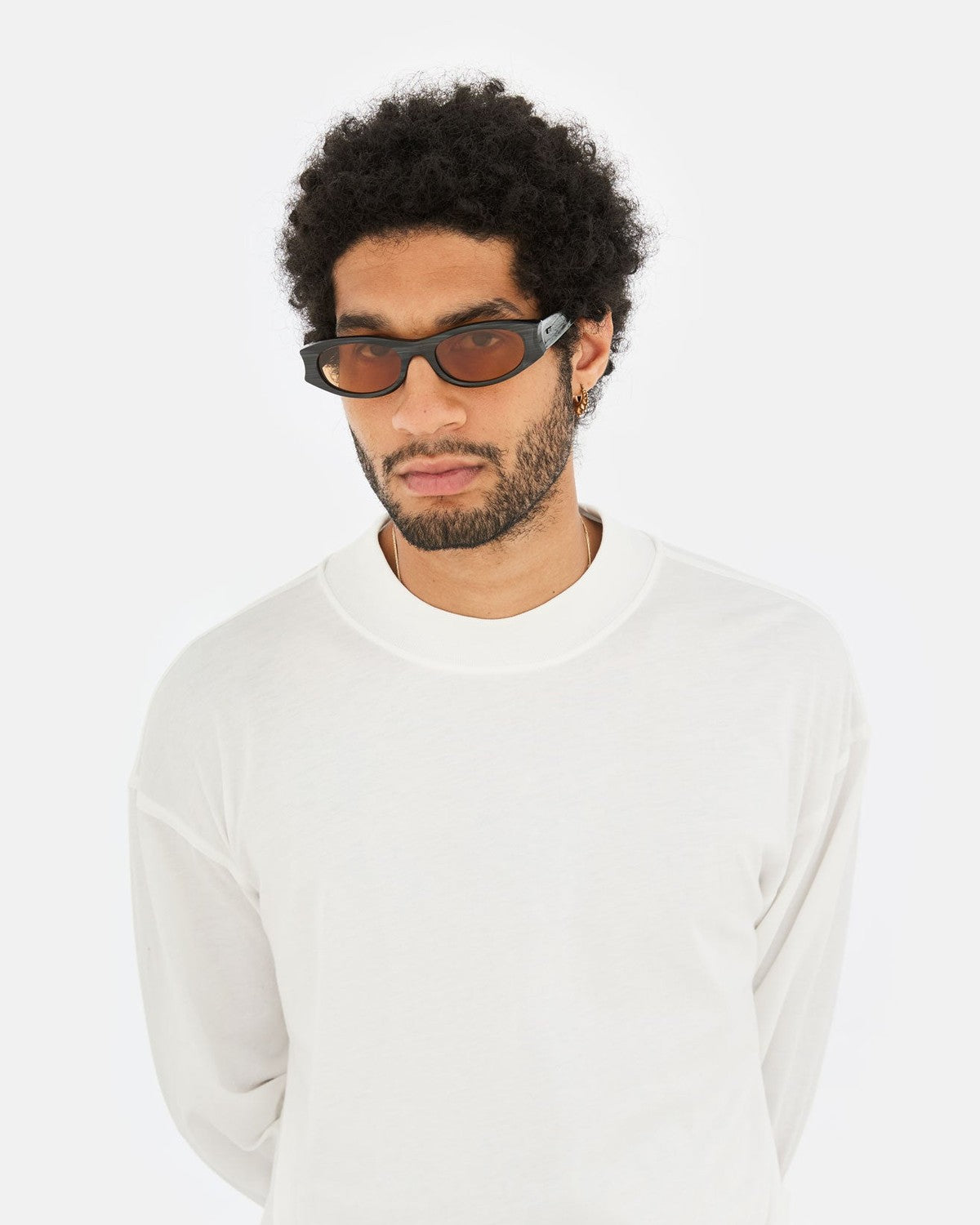 Model wearing RETROSUPERFUTURE Razzo Fiammato sunglasses.