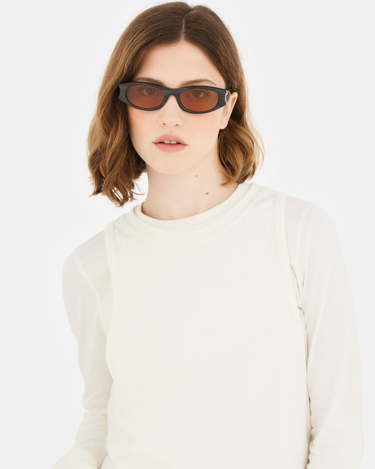 Front view of a model wearing RETROSUPERFUTURE Razzo Fiammato sunglasses.