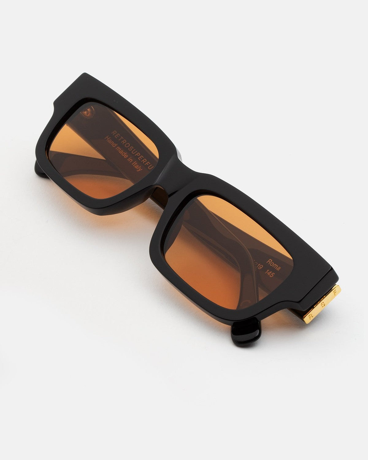 Overhead view of RETROSUPERFUTURE Roma Refined sunglasses showing gold-tone temple detail.