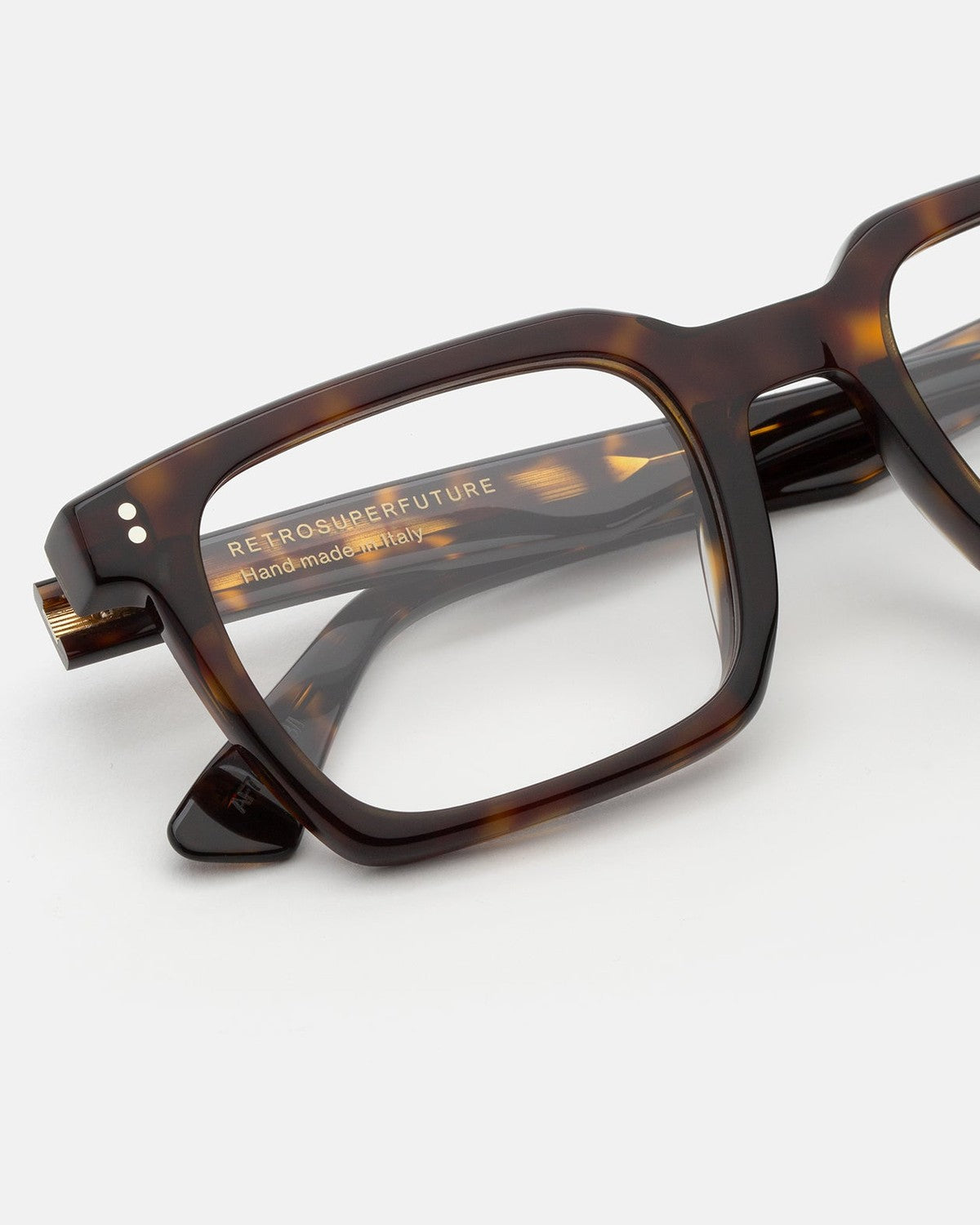 Close-up of the temple branding and hinge on RETROSUPERFUTURE Secolo 3627 eyeglasses.