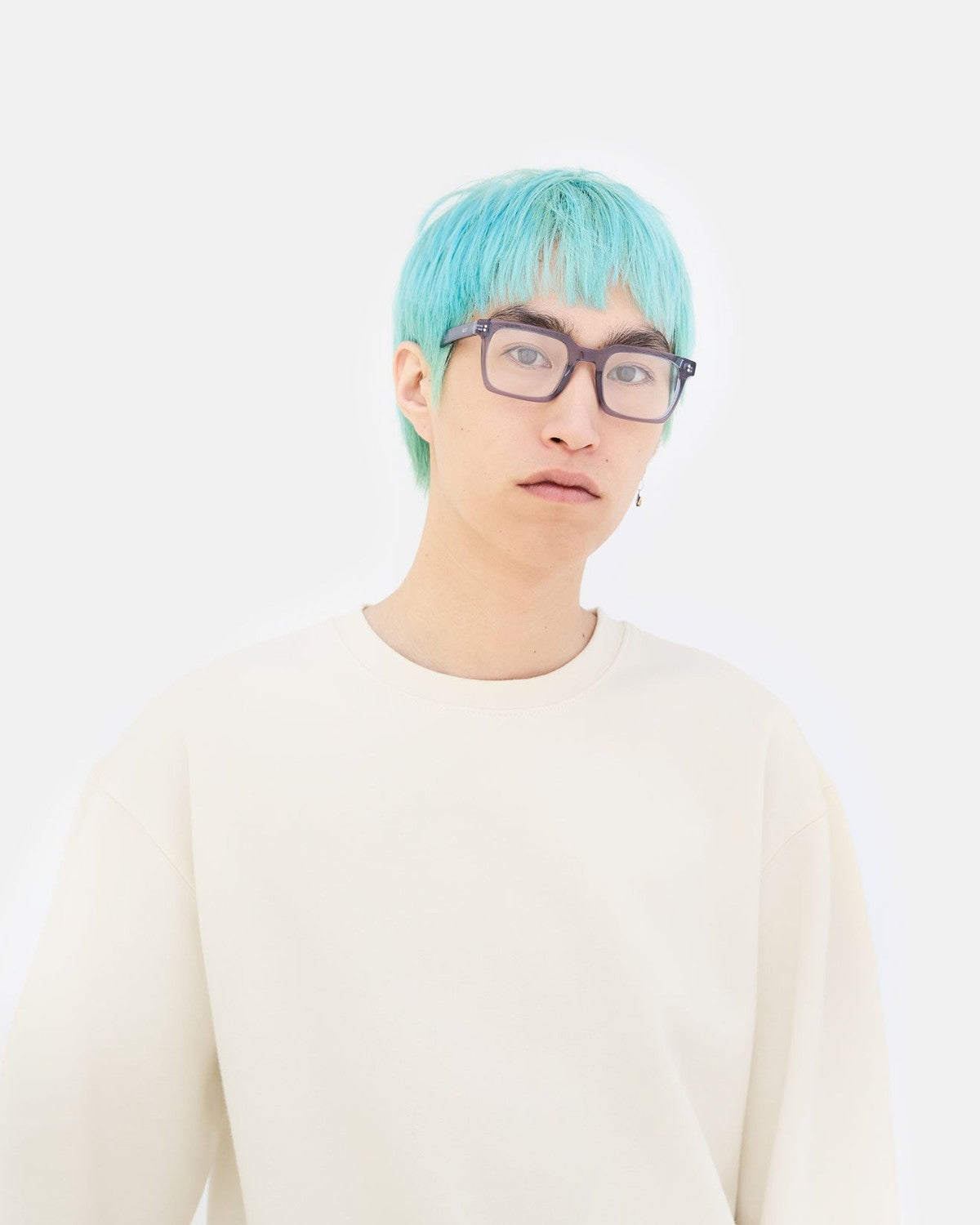 Model wearing RETROSUPERFUTURE Secolo Marino eyeglasses facing forward.
