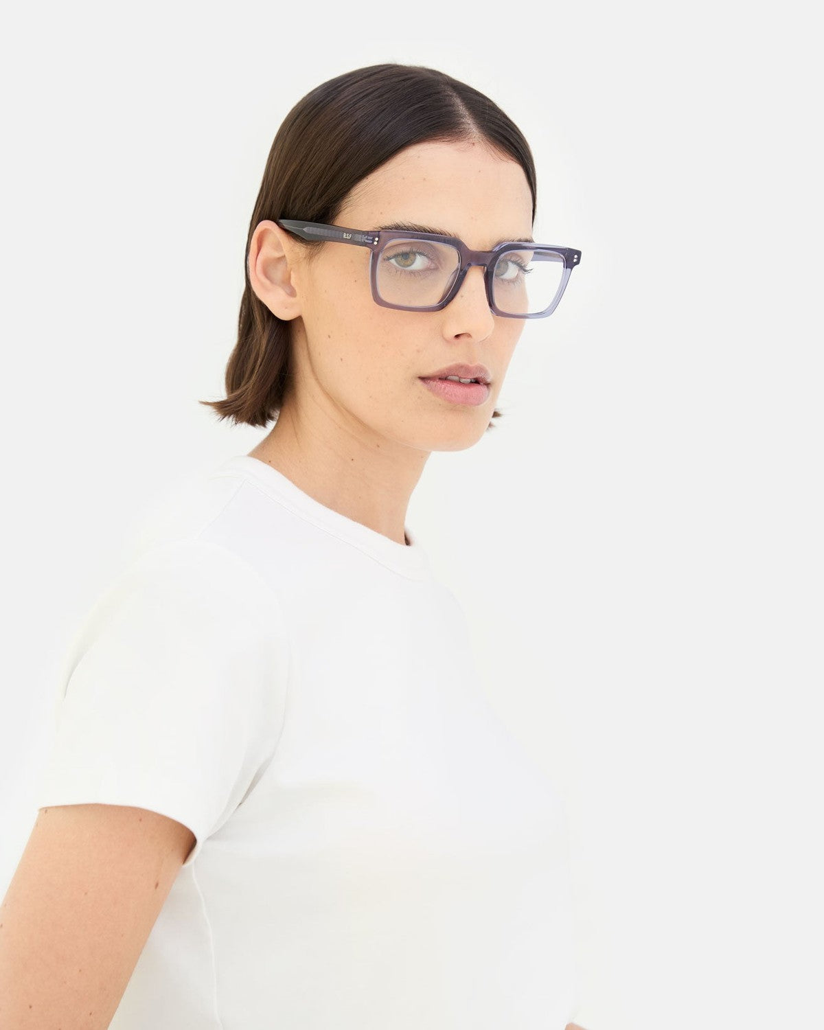 Model wearing RETROSUPERFUTURE Secolo Marino eyeglasses in side profile.