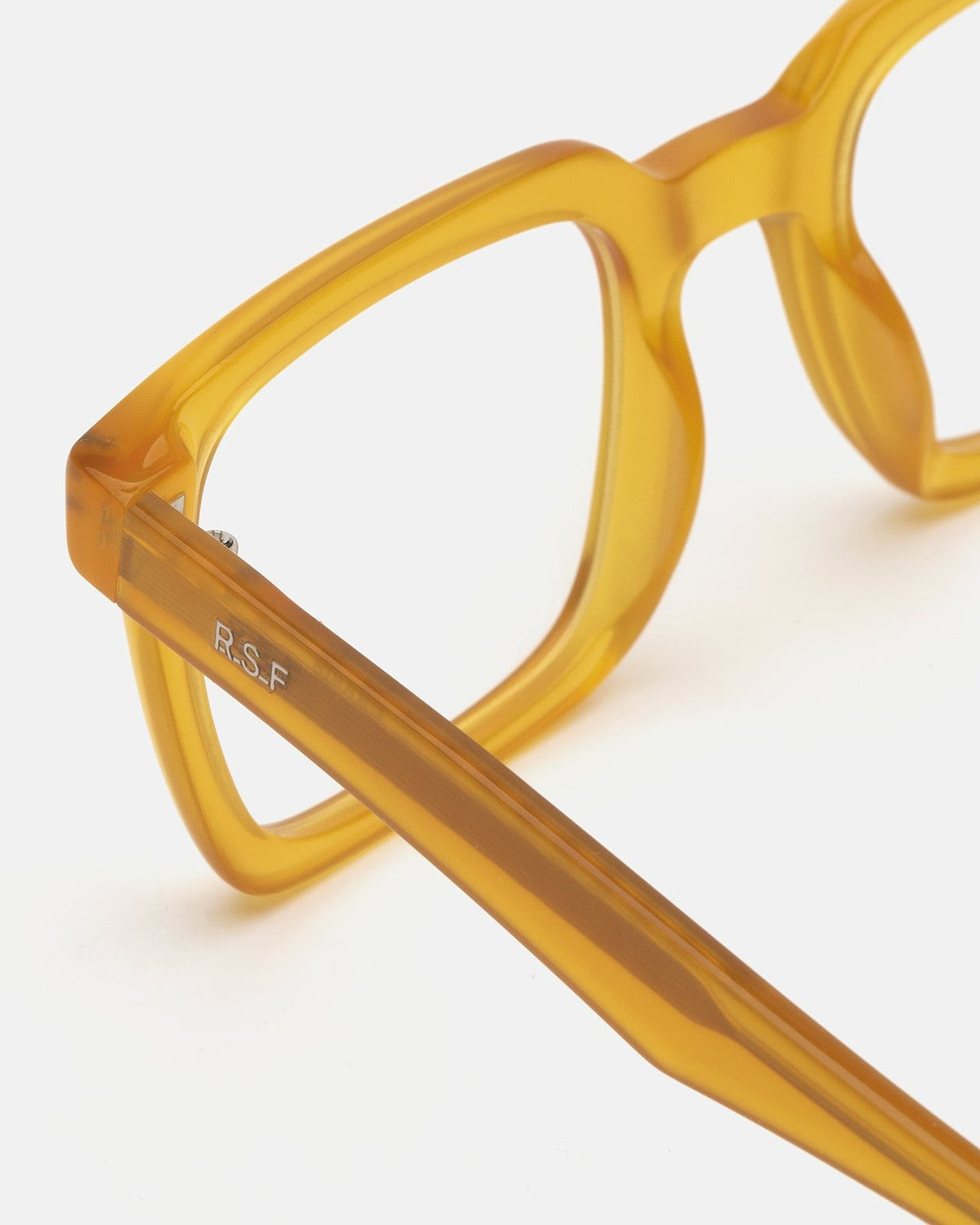 Close-up of the temple and hinge on RETROSUPERFUTURE Secolo Sereno eyeglasses.