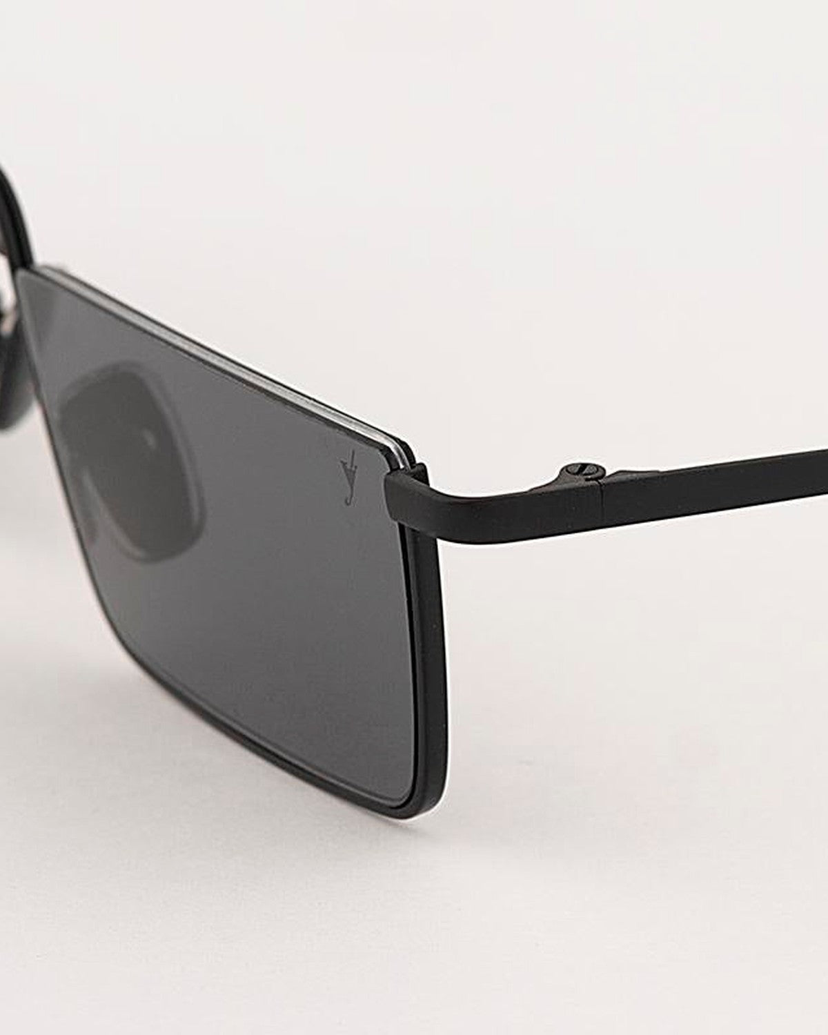 Angled detail of the temple and lens of EYEPETIZER SHIBUYA C.6-63 sunglasses.