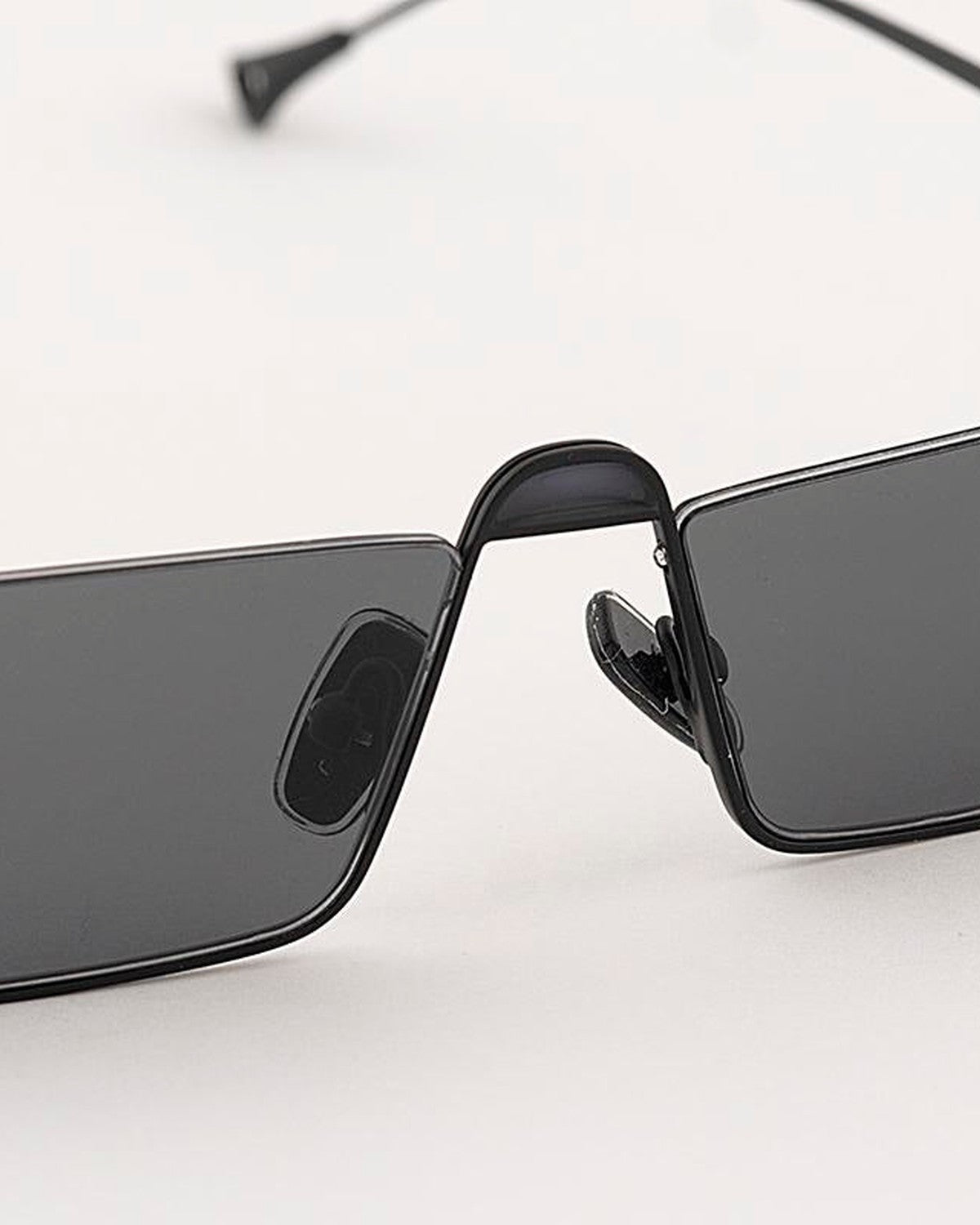 Close-up of the nose bridge and adjustable nose pads on EYEPETIZER SHIBUYA C.6-63 sunglasses.