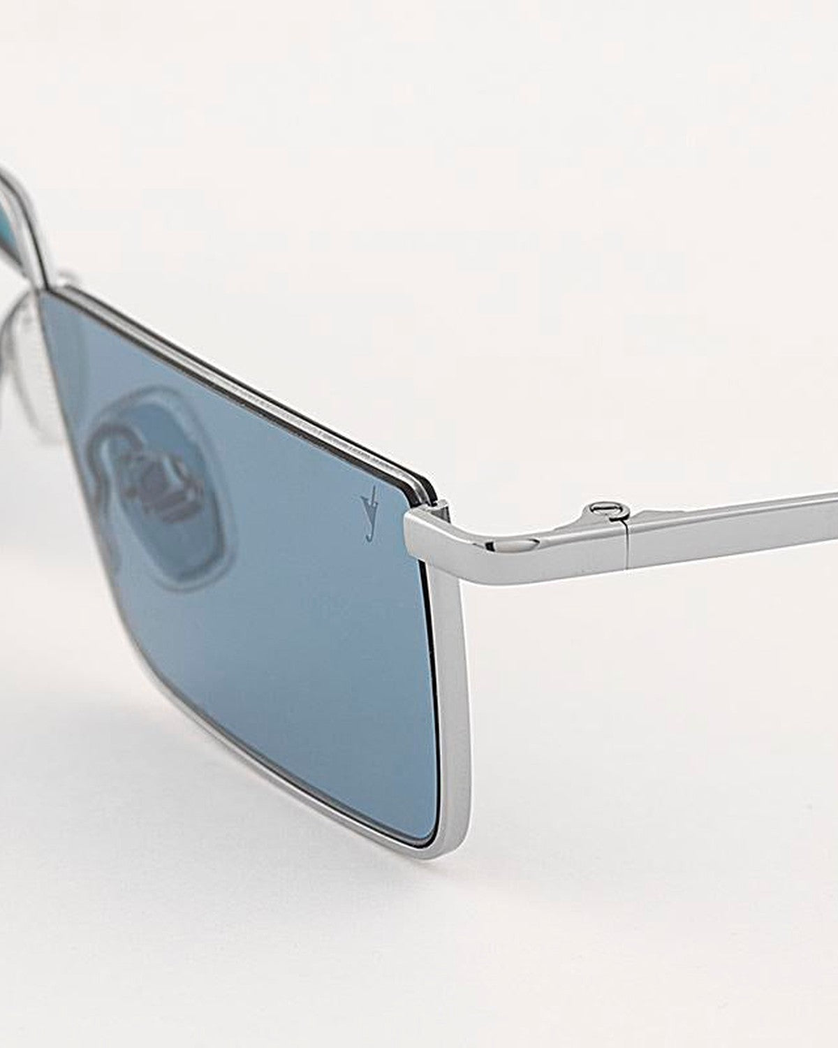 Angle view showing the rectangular lens and metal temple of EYEPETIZER SHIBUYA C.1-65 sunglasses.