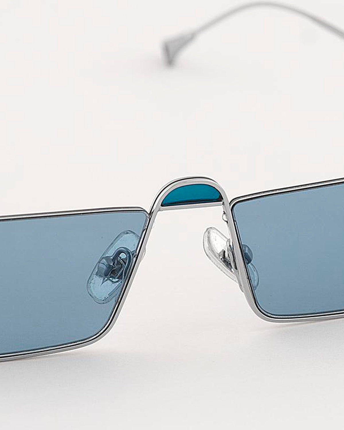 Detail of the nose bridge and adjustable nose pads on EYEPETIZER SHIBUYA C.1-65 sunglasses.