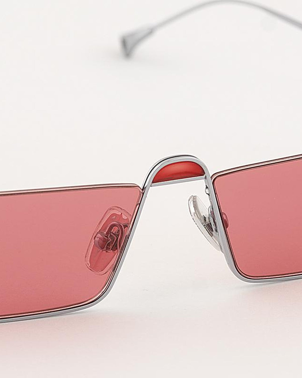 Detail of the nose bridge and adjustable nose pads on EYEPETIZER SHIBUYA C.1-66 sunglasses.