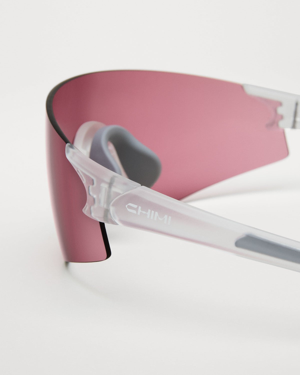 Detail of the frosted clear temple with CHIMI branding on Sierra Frosted Clear sunglasses.