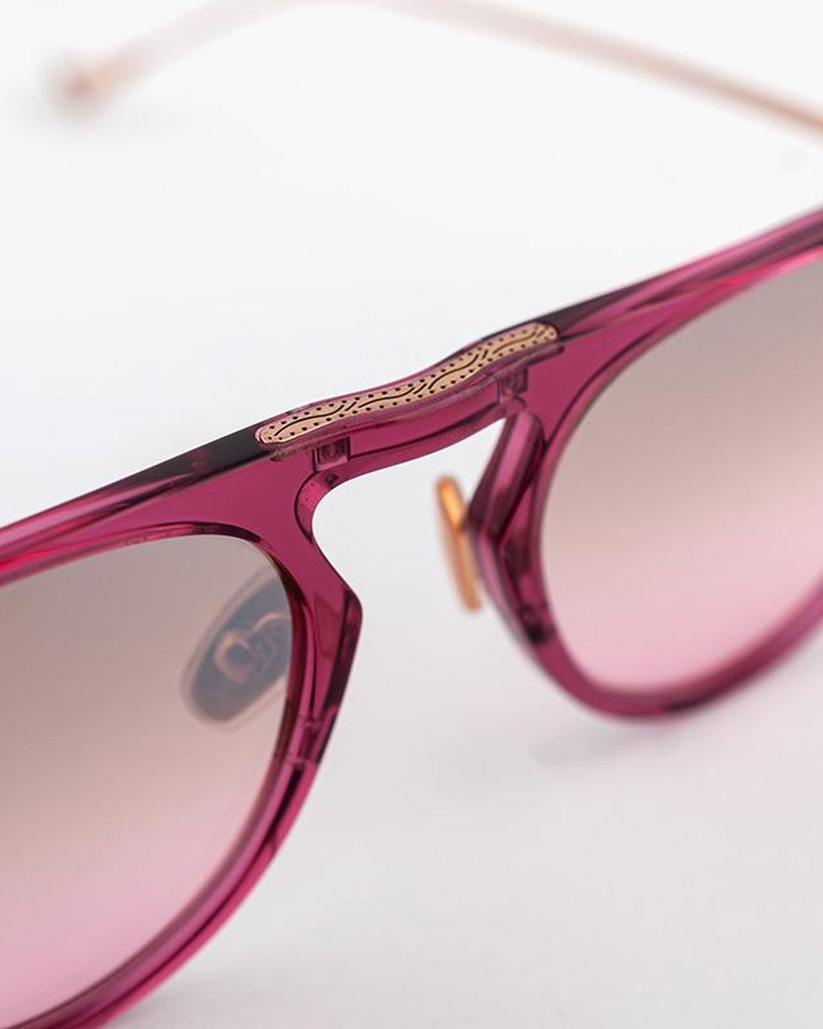 Close-up of the bridge and decorative metal detailing on EYEPETIZER STEVEN C.N/N-9-44F sunglasses.