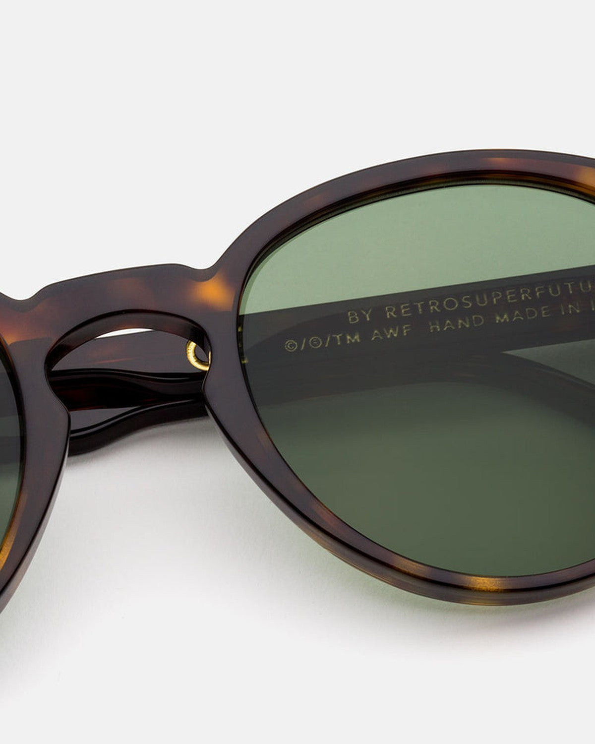 Close-up of the lens and branding on RETROSUPERFUTURE The Warhol 3627 Green sunglasses.