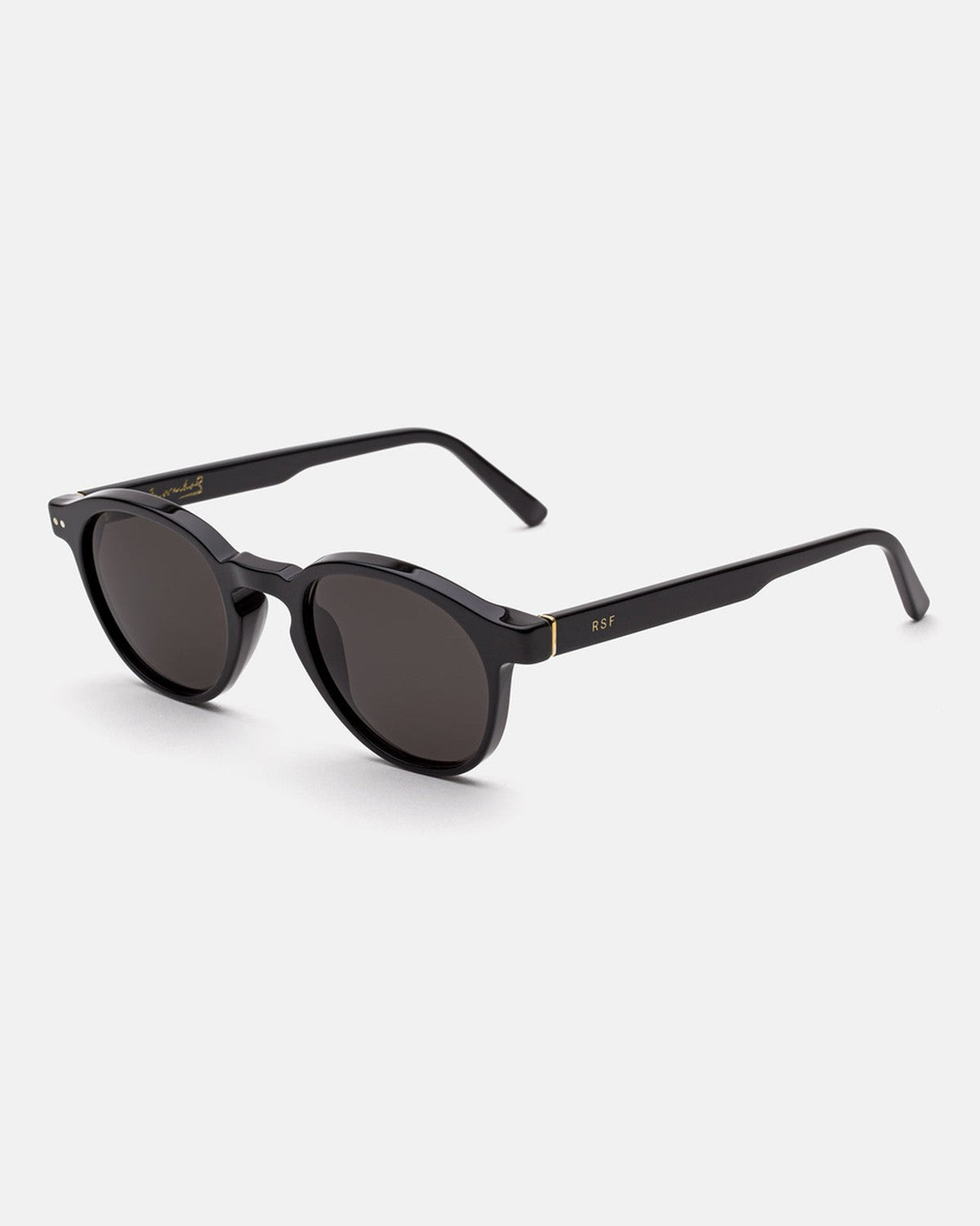 Angled view of RETROSUPERFUTURE The Warhol Black sunglasses showing the temple and gold RSF logo detail.