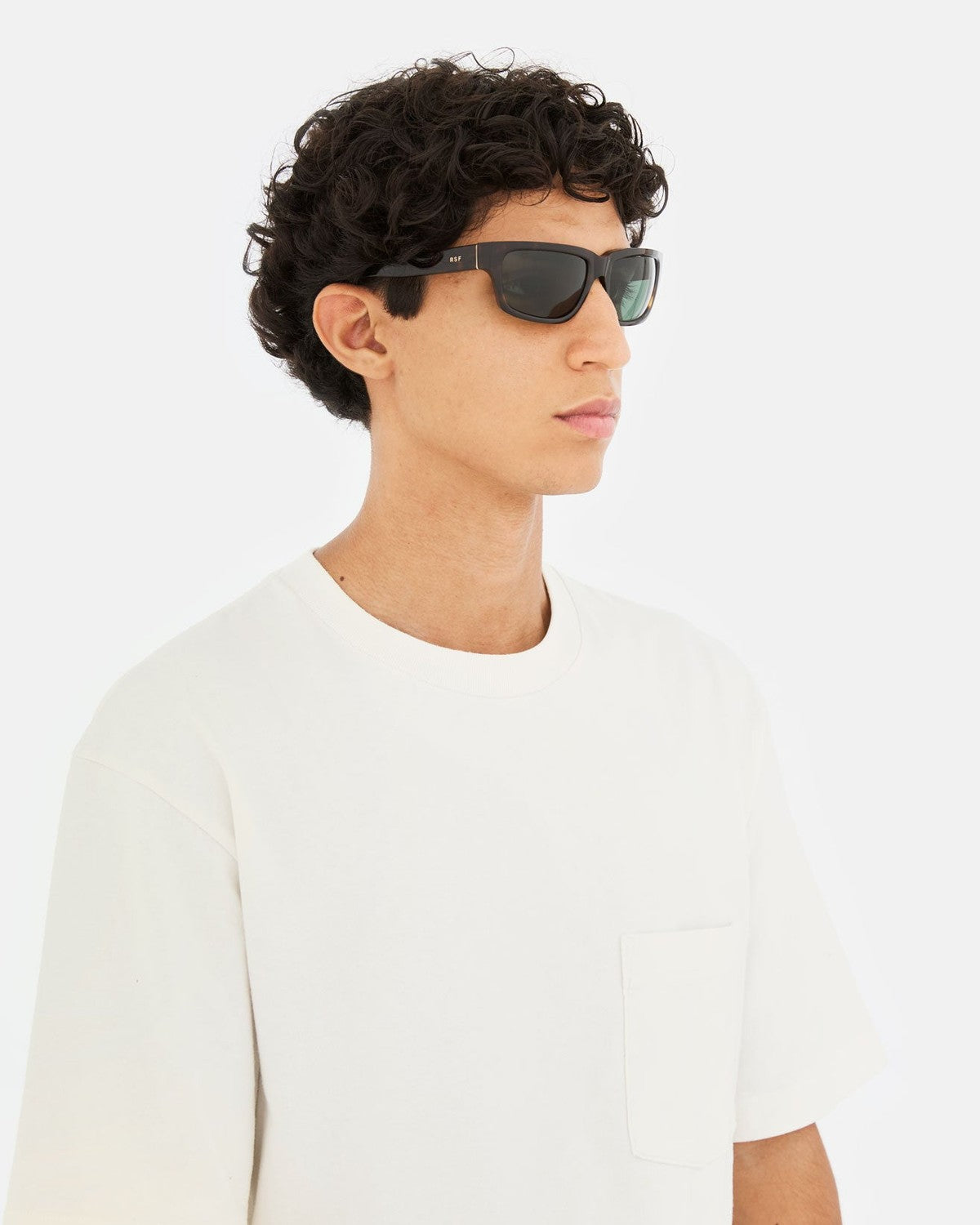 Model wearing RETROSUPERFUTURE Thelonius 3627 sunglasses, front angle view.