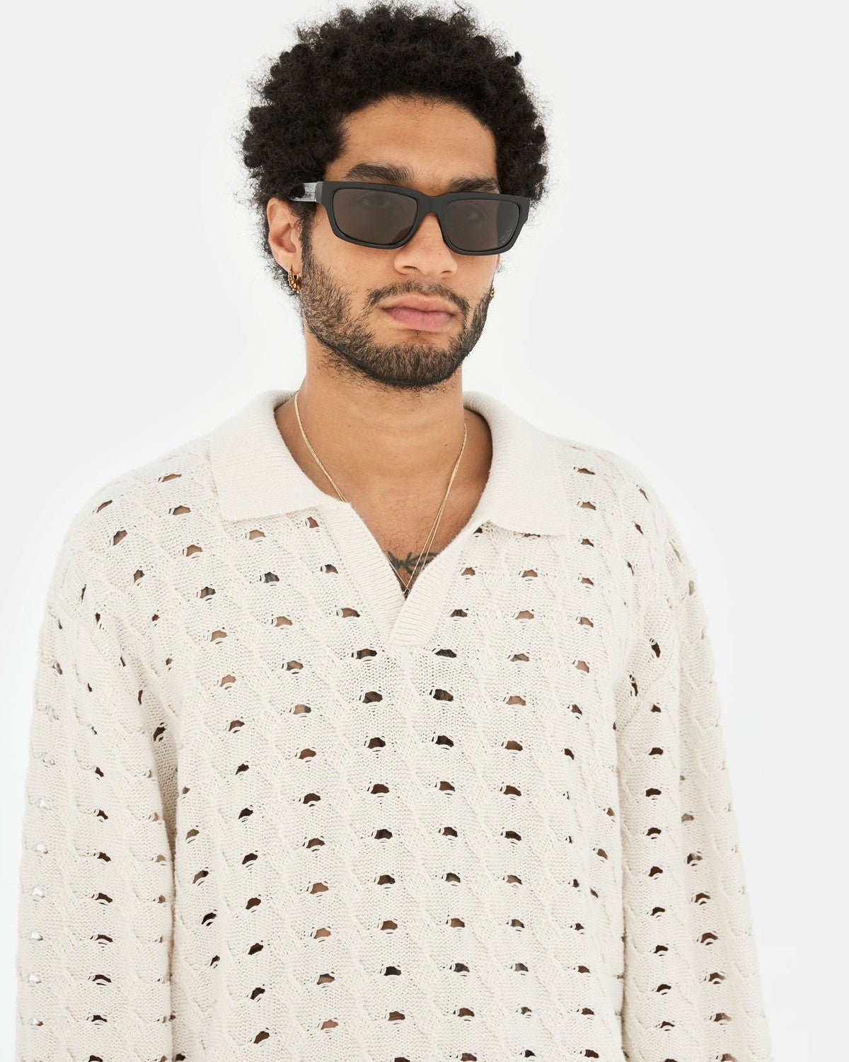 Model wearing RETROSUPERFUTURE Thelonius Black sunglasses.