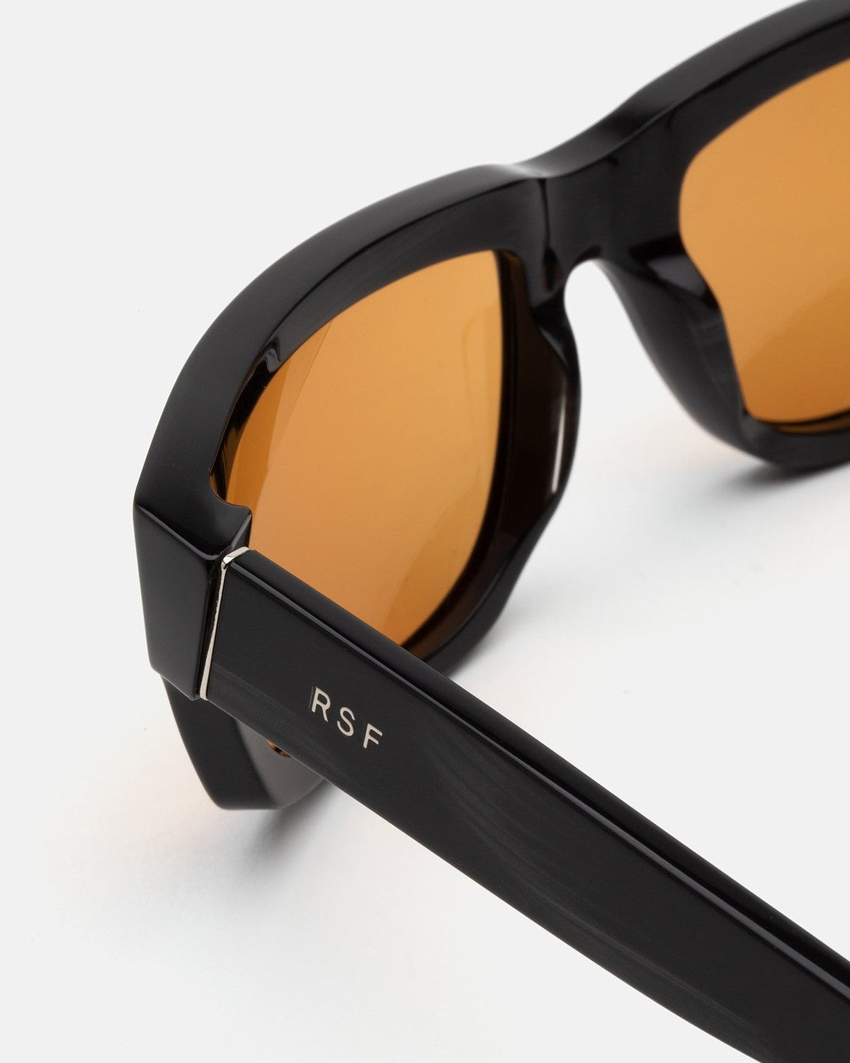 Close-up of the temple hinge on RETROSUPERFUTURE Thelonius Fiammato sunglasses.