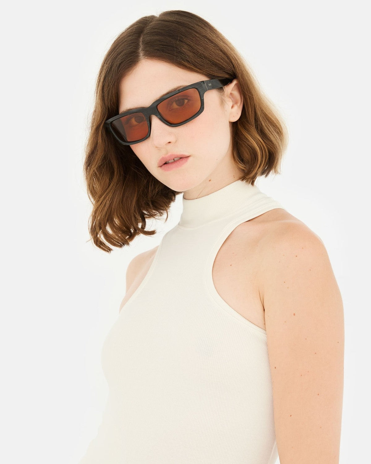Model wearing RETROSUPERFUTURE Thelonius Fiammato sunglasses.