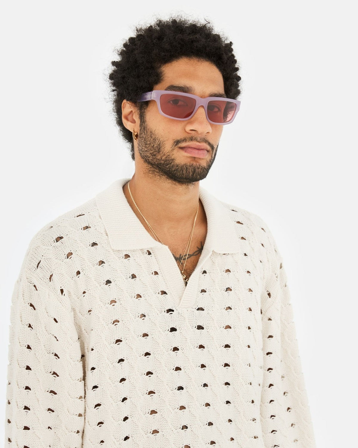 Model wearing RETROSUPERFUTURE Thelonius Light Purple sunglasses indoors.