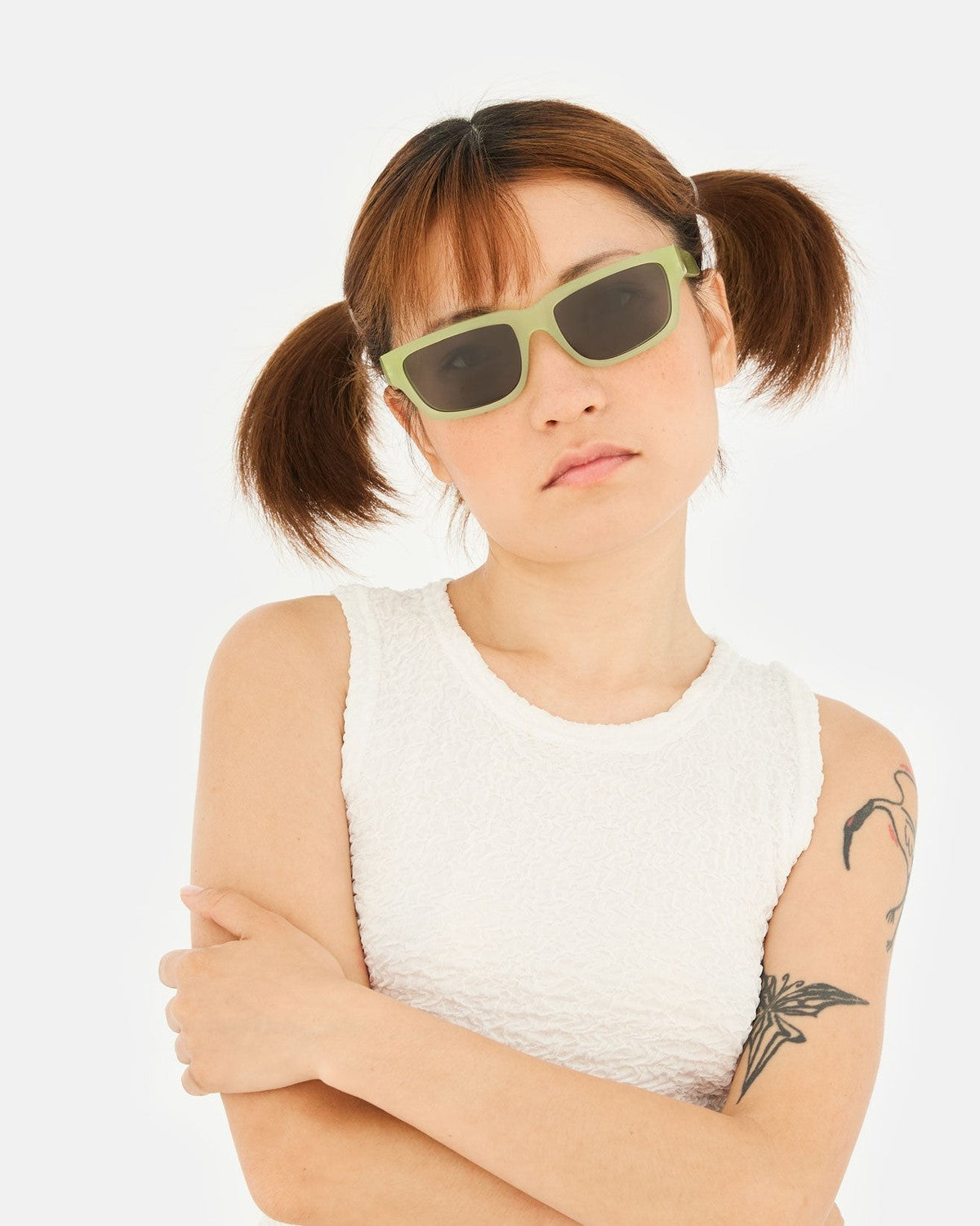 Model wearing RETROSUPERFUTURE Thelonius Lime sunglasses.