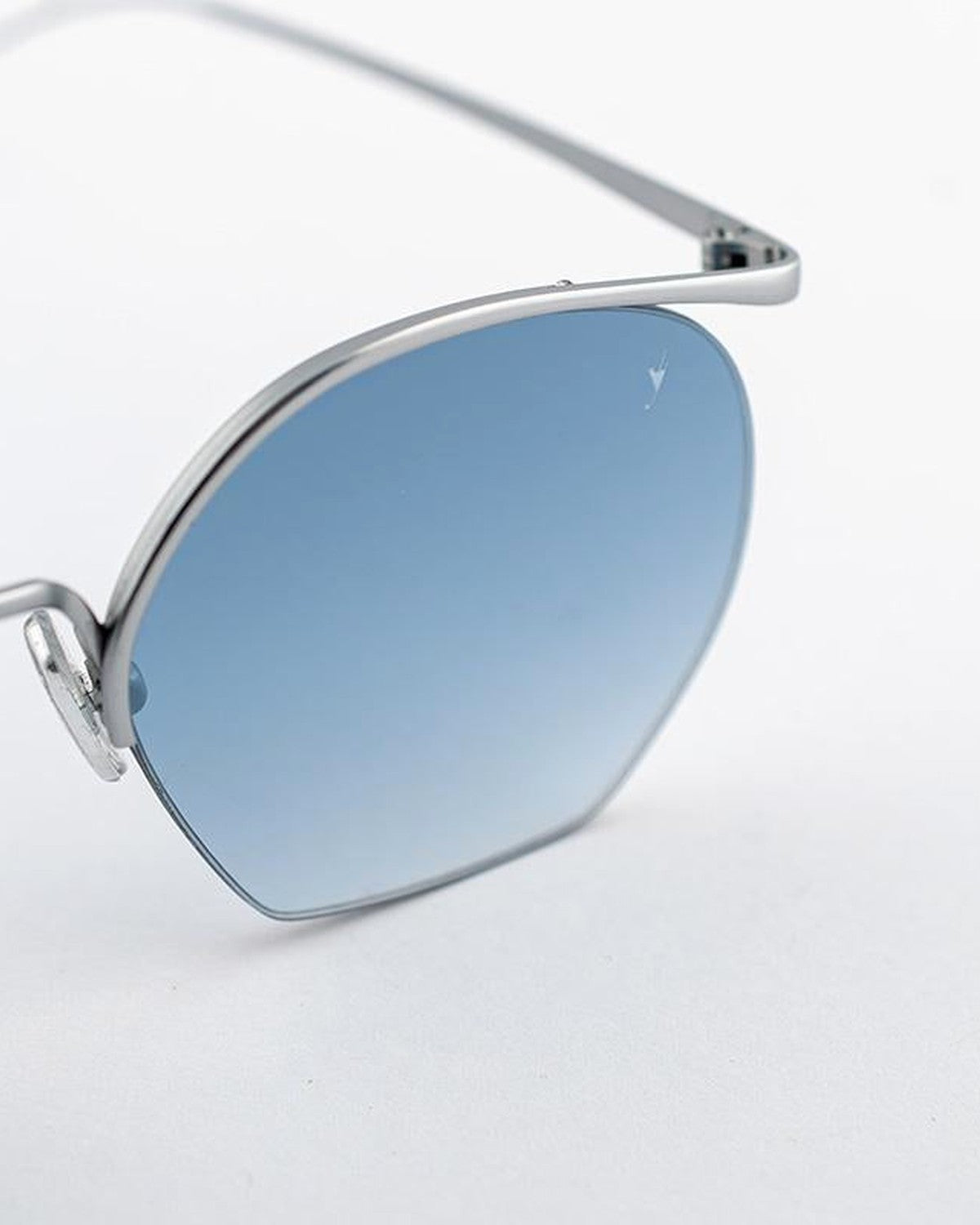 Angled close-up showing the left lens and temple of EYEPETIZER TIBERIO C.1-OP-26F sunglasses.