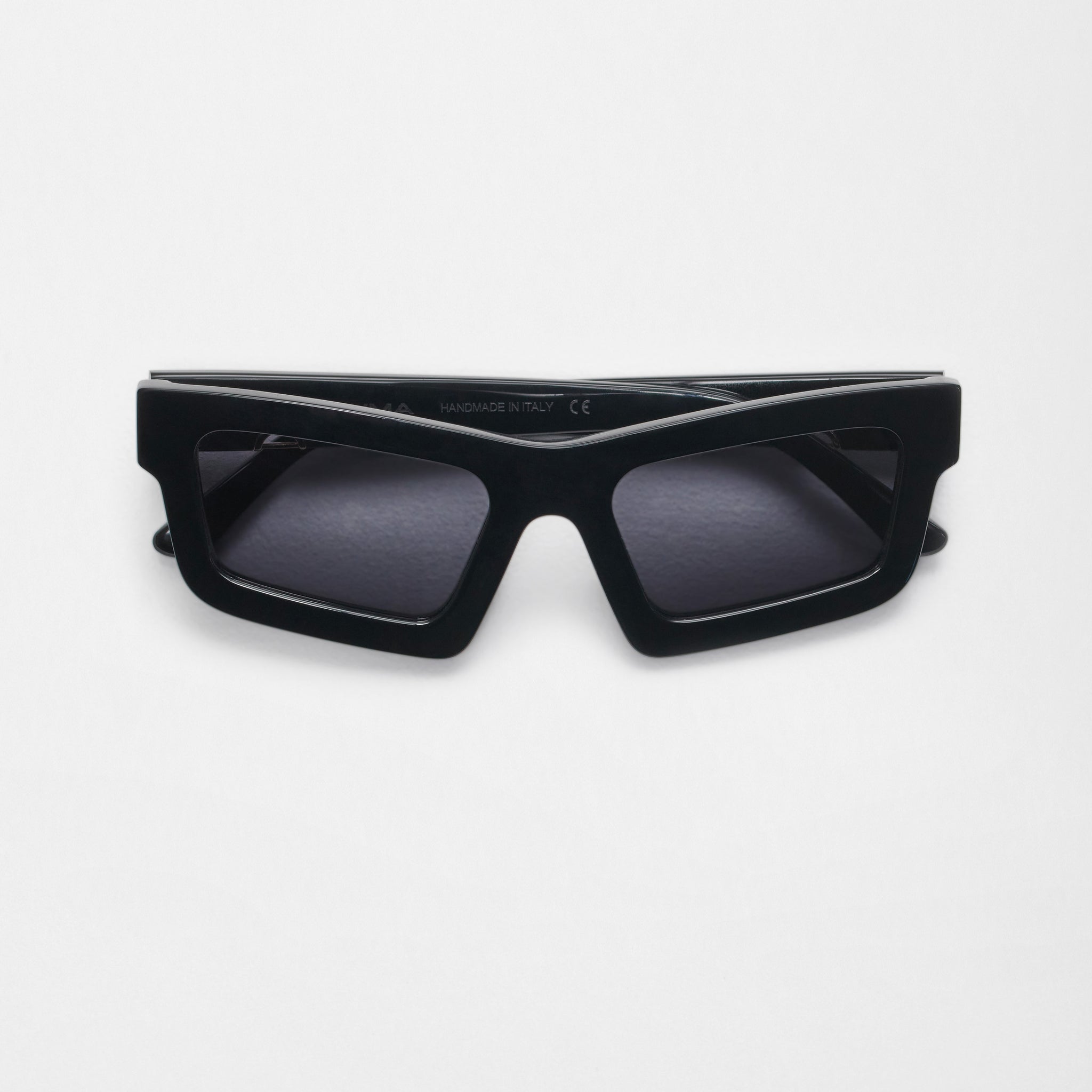 Tilde . Black