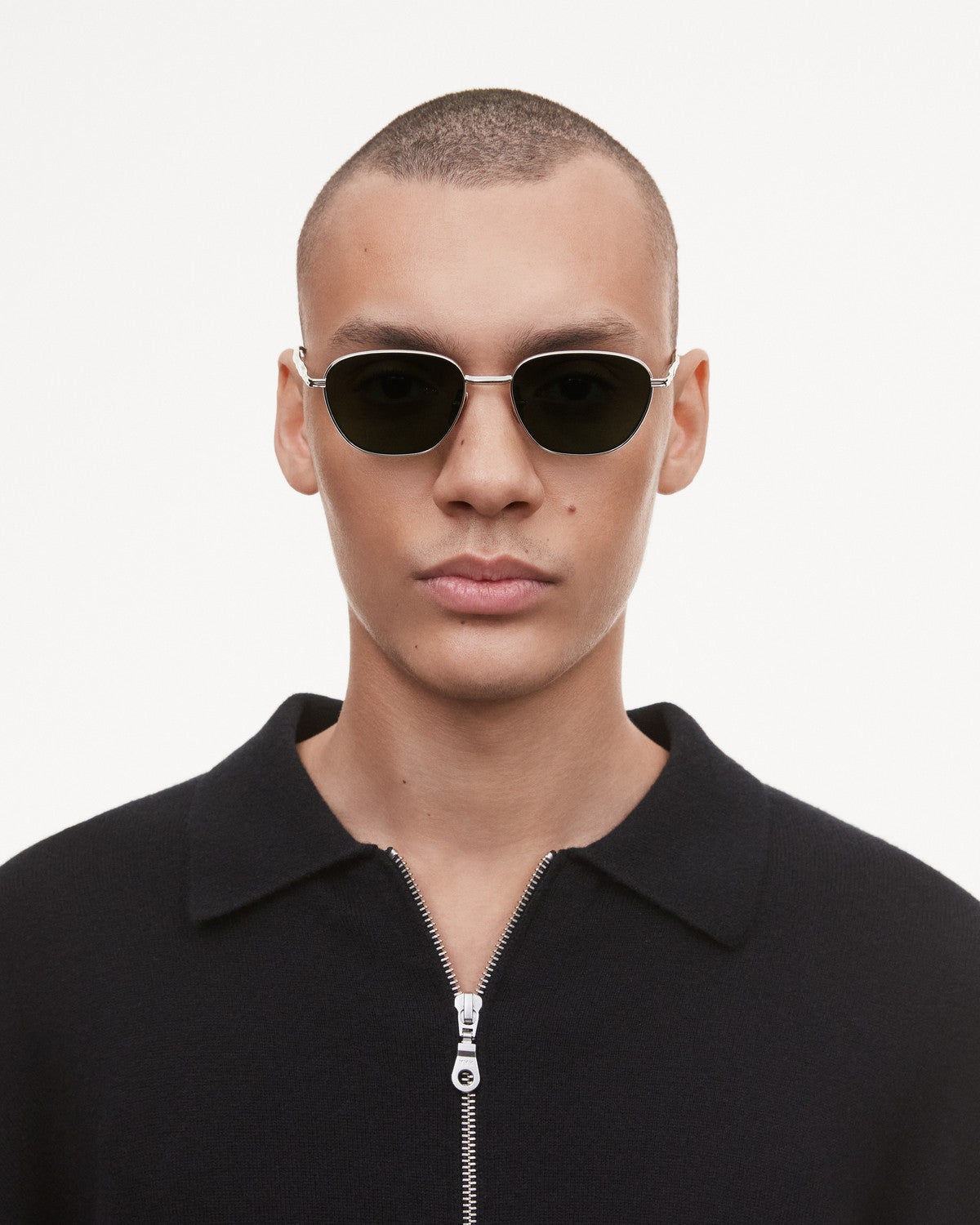 Model wearing CHIMI Polygon Green Green sunglasses, straight-on view.