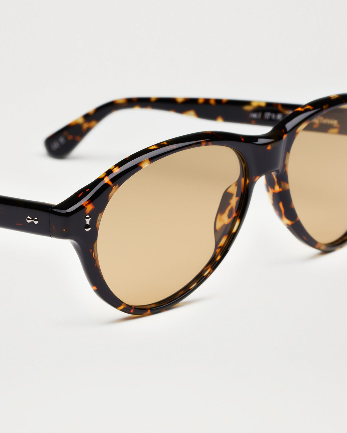 Close-up of the frame and hinge details on CHIMI Tome Feral Tortoise Yellow Lens Sunglasses