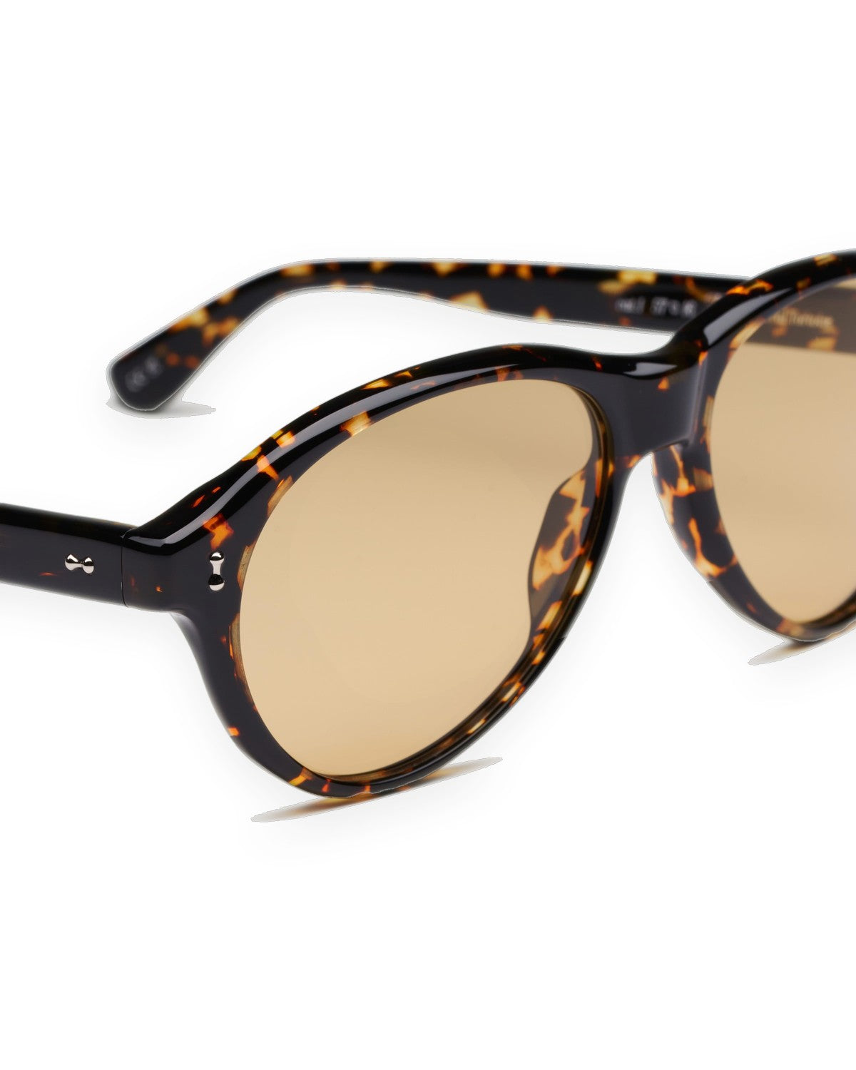 Angled detail of CHIMI Tome Feral Tortoise Yellow Lens sunglasses showing tortoise pattern and temple studs.