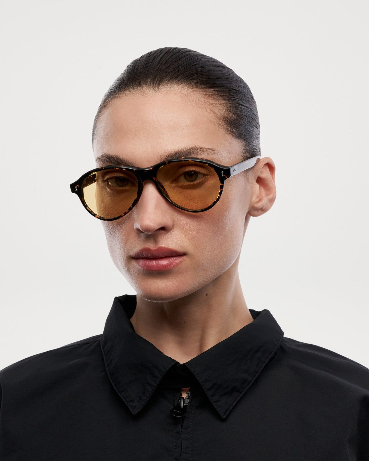Front try-on view of CHIMI Tome Feral Tortoise Yellow Lens sunglasses on model.