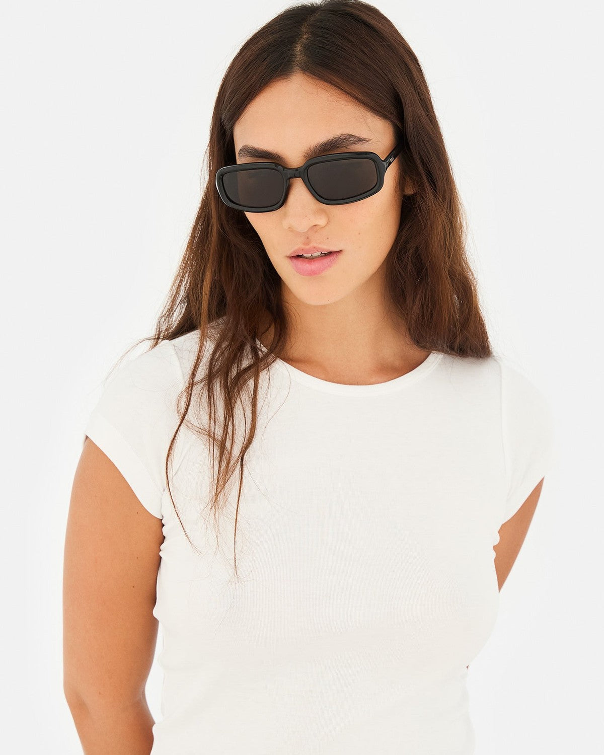 Model wearing RETROSUPERFUTURE Troll Black sunglasses, front view.